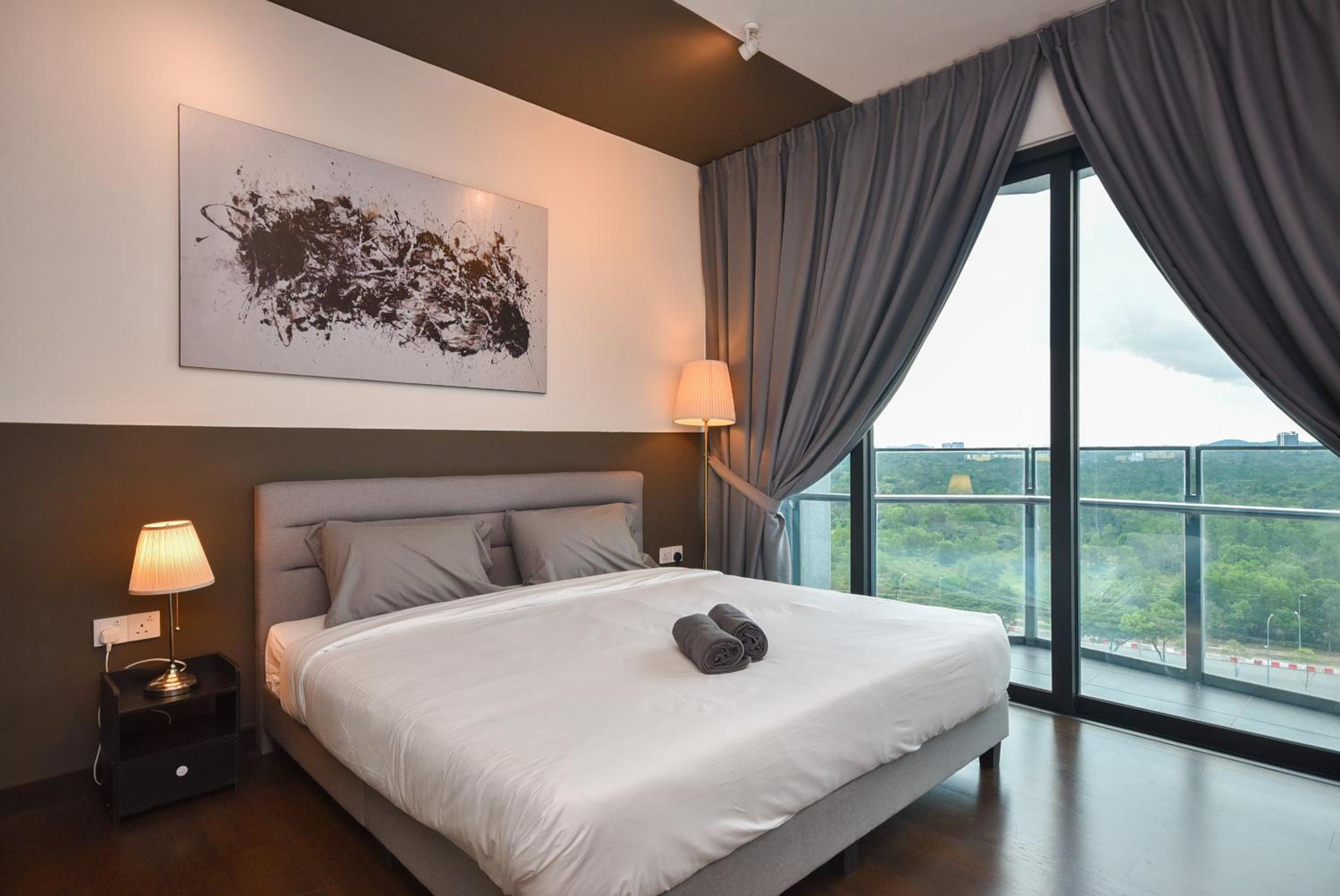 One-Bedroom Apartment with Balcony and City View