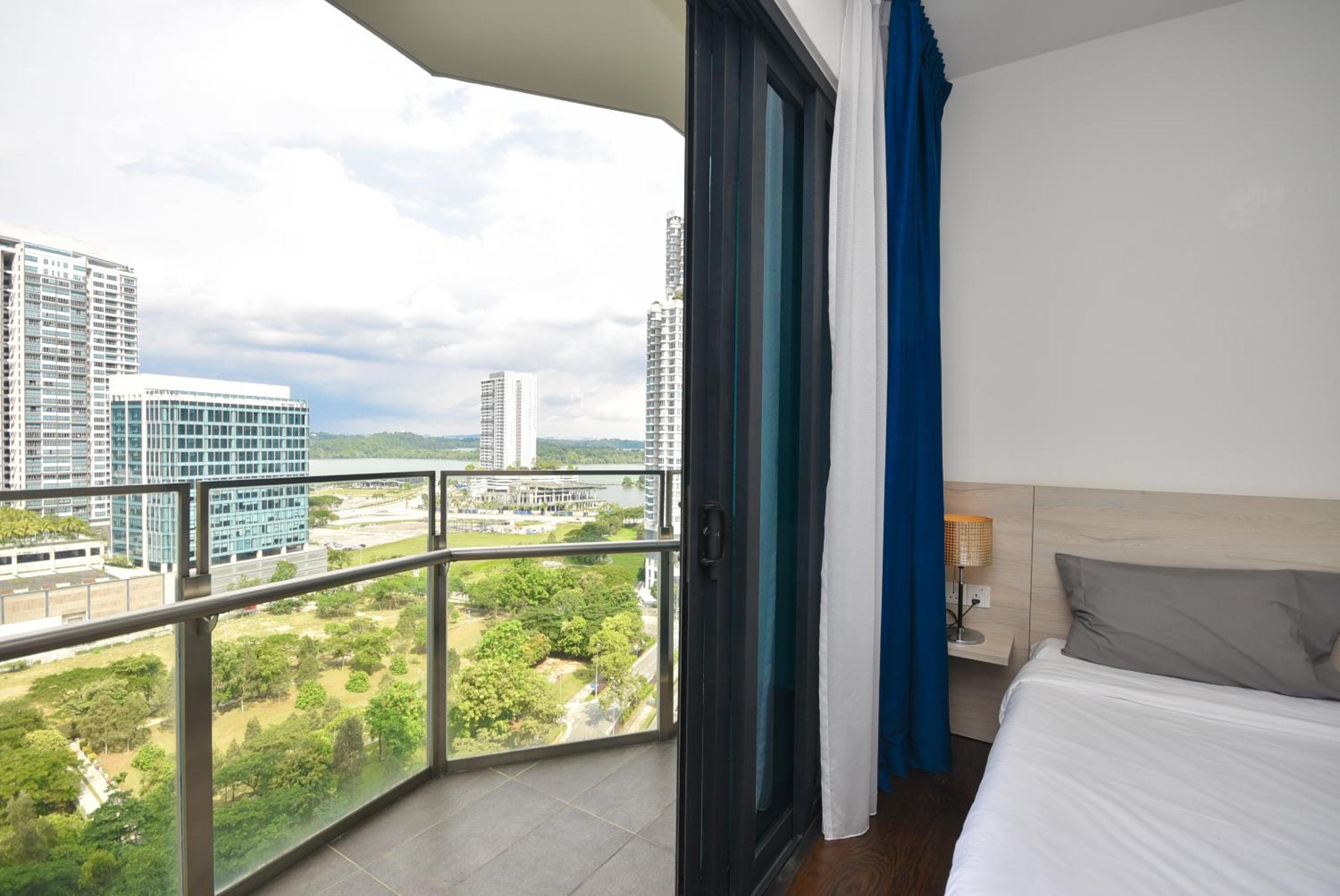 One-Bedroom Apartment with Balcony and City View