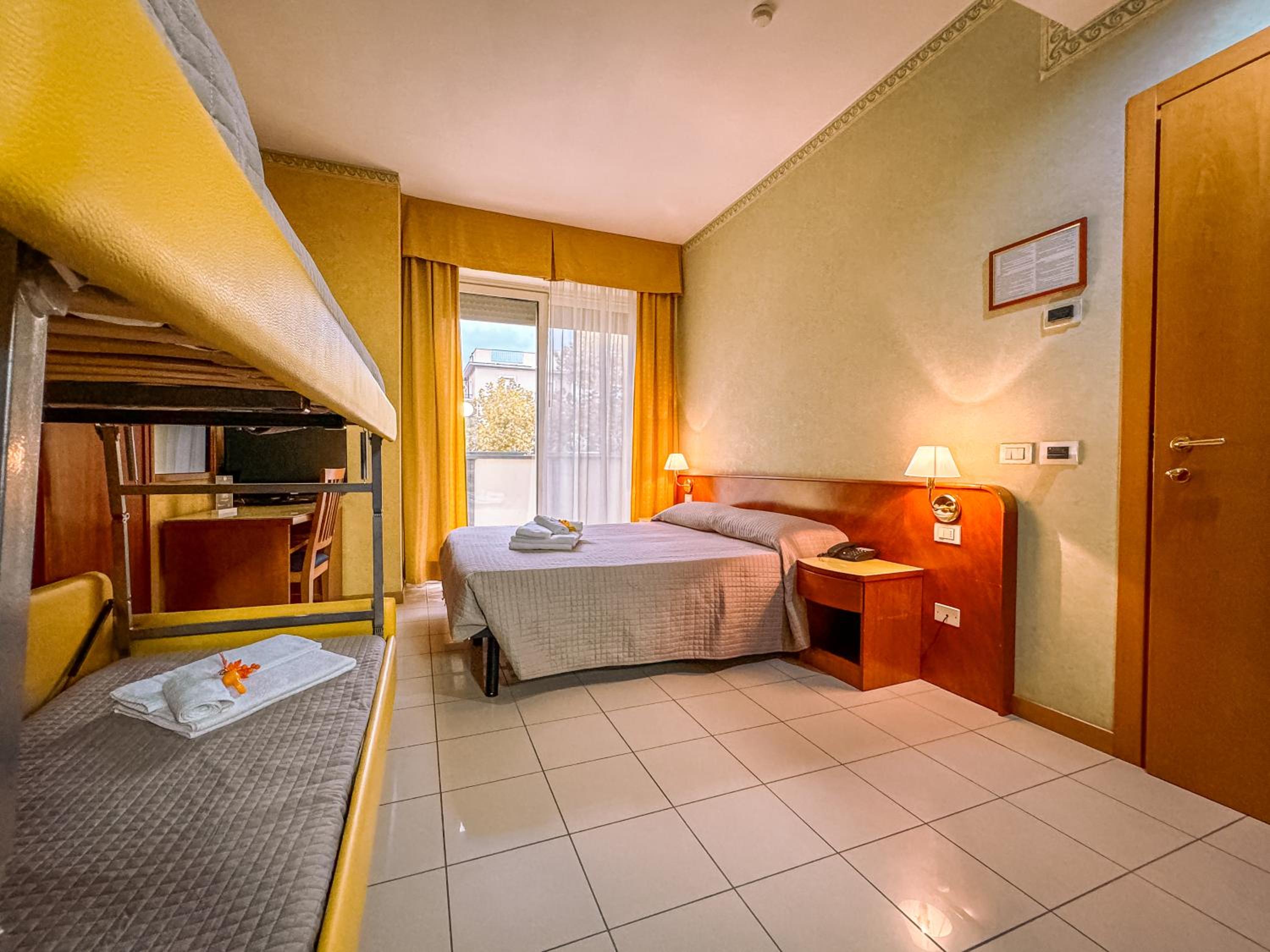Quadruple Room with Balcony photo 2