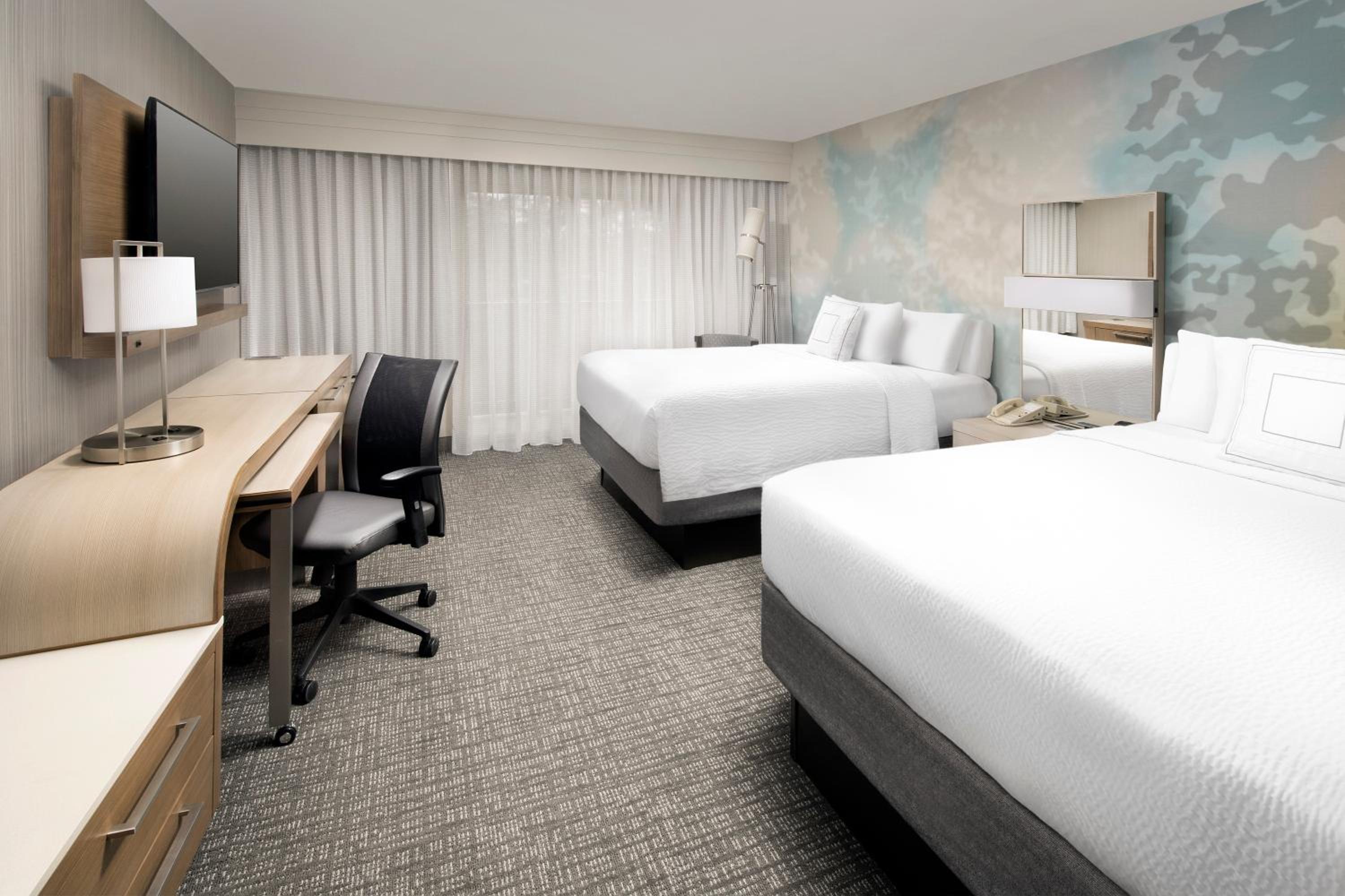 Queen Room with Two Queen Beds - Photo 1