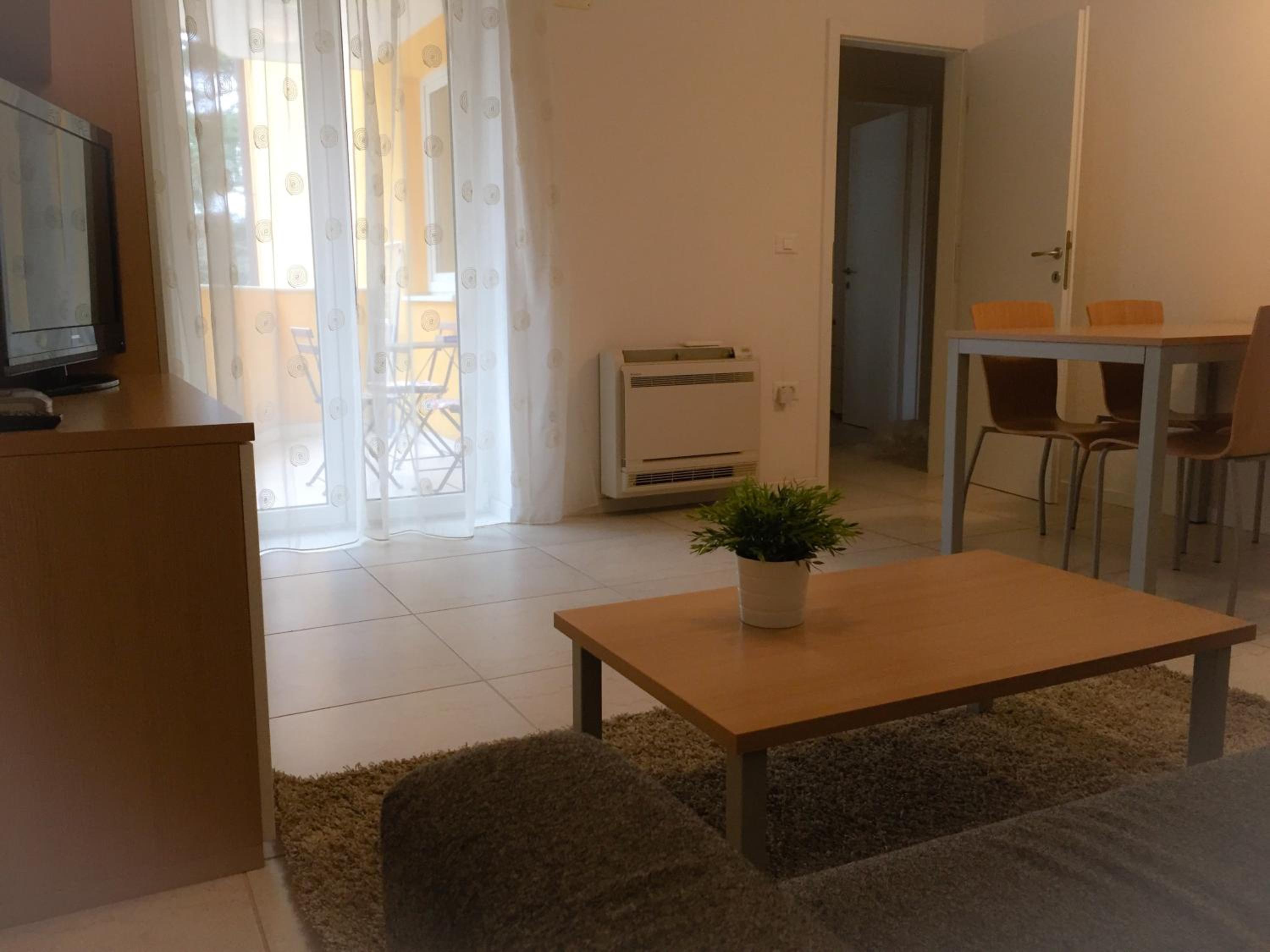 One-Bedroom Apartment with Balcony