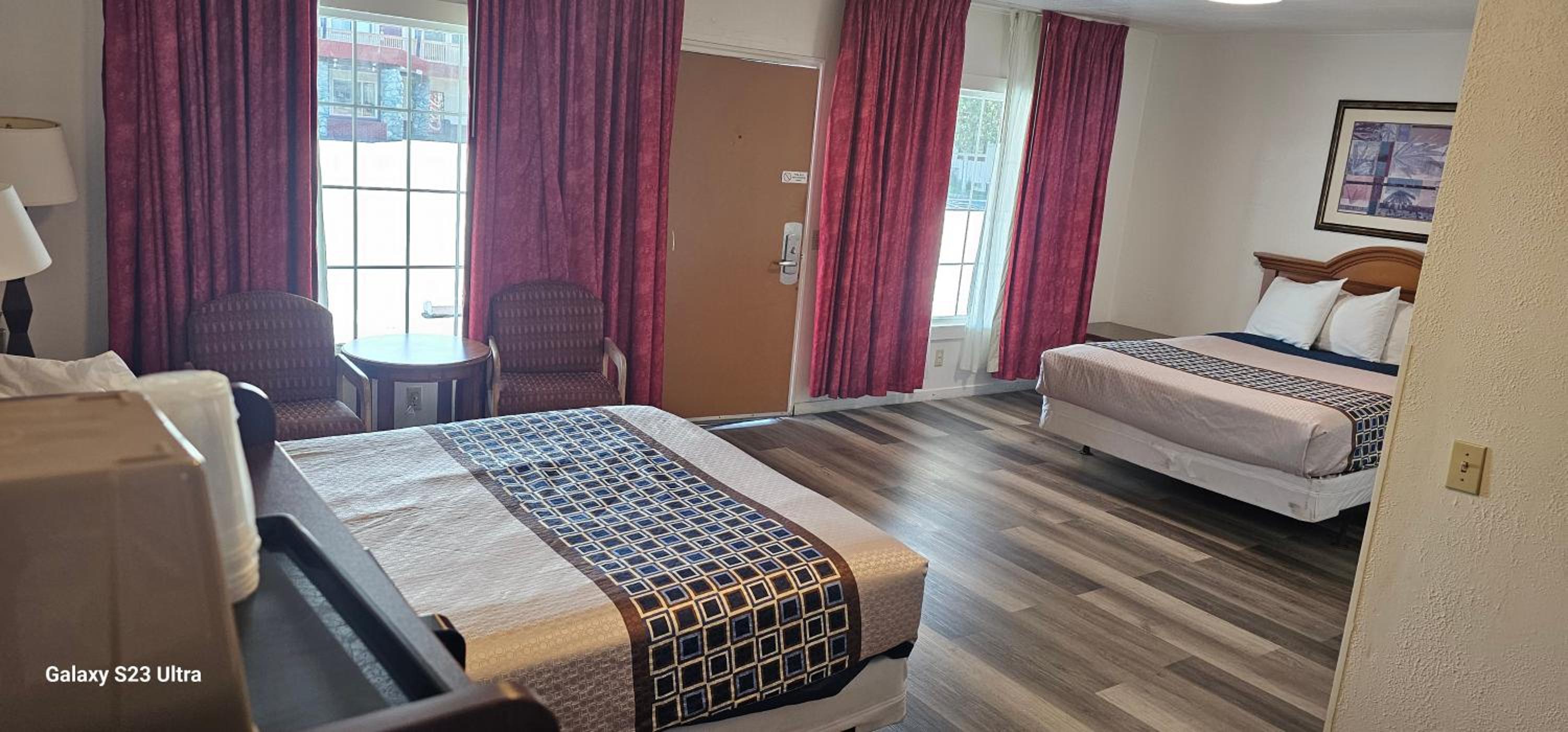 Queen Room with Two Queen Beds - Photo 1