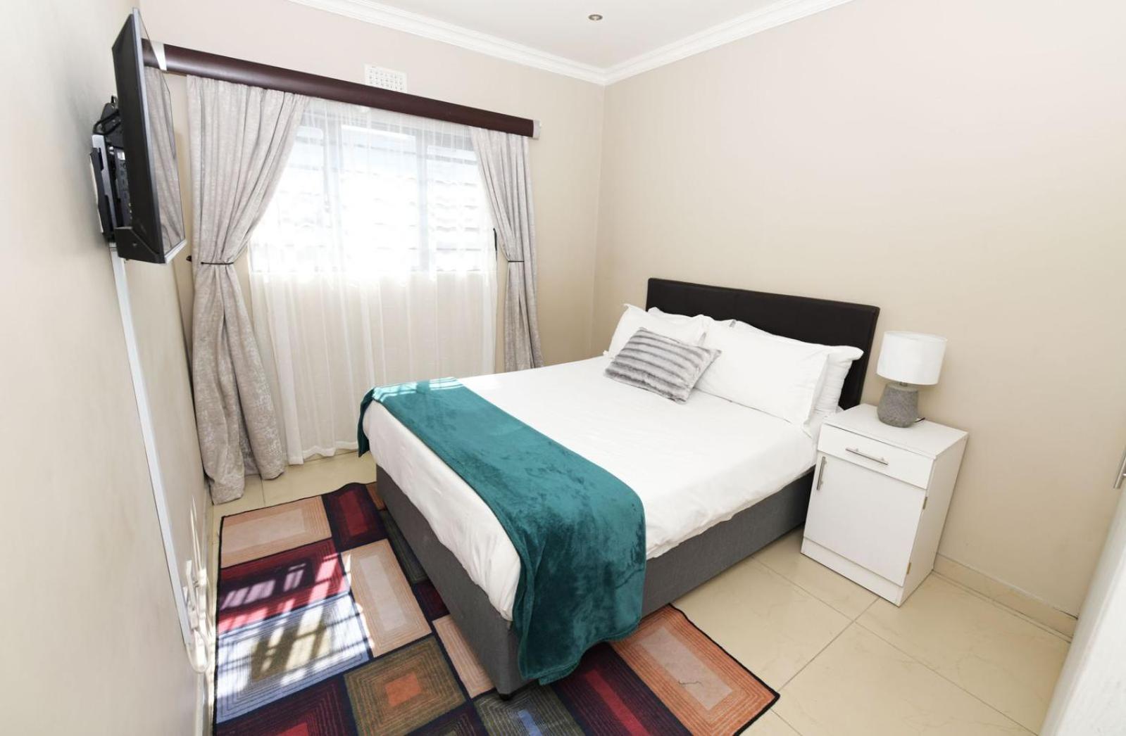 Two-Bedroom Apartment - Photo 21