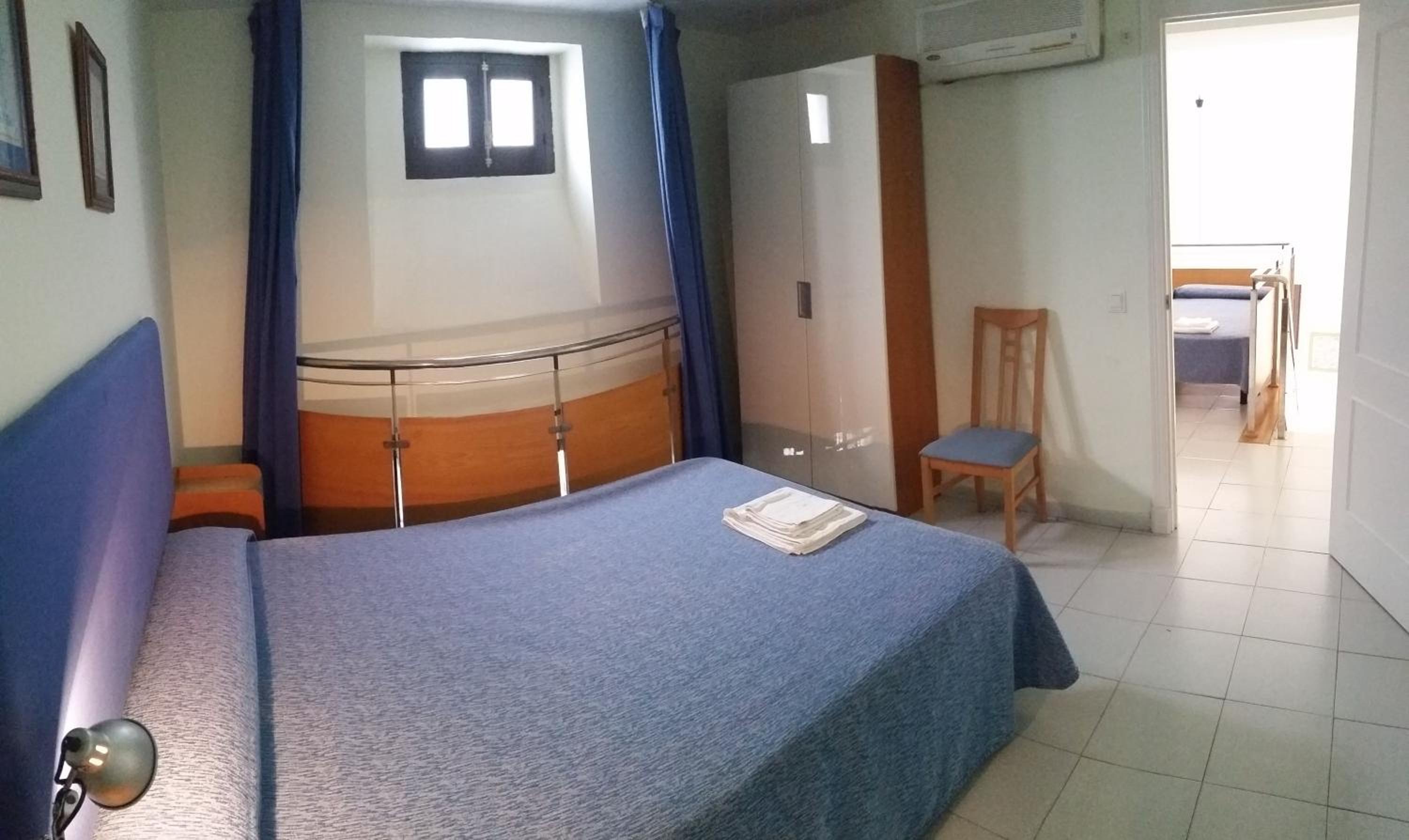 Three-Bedroom Apartment with Balcony - Photo 27
