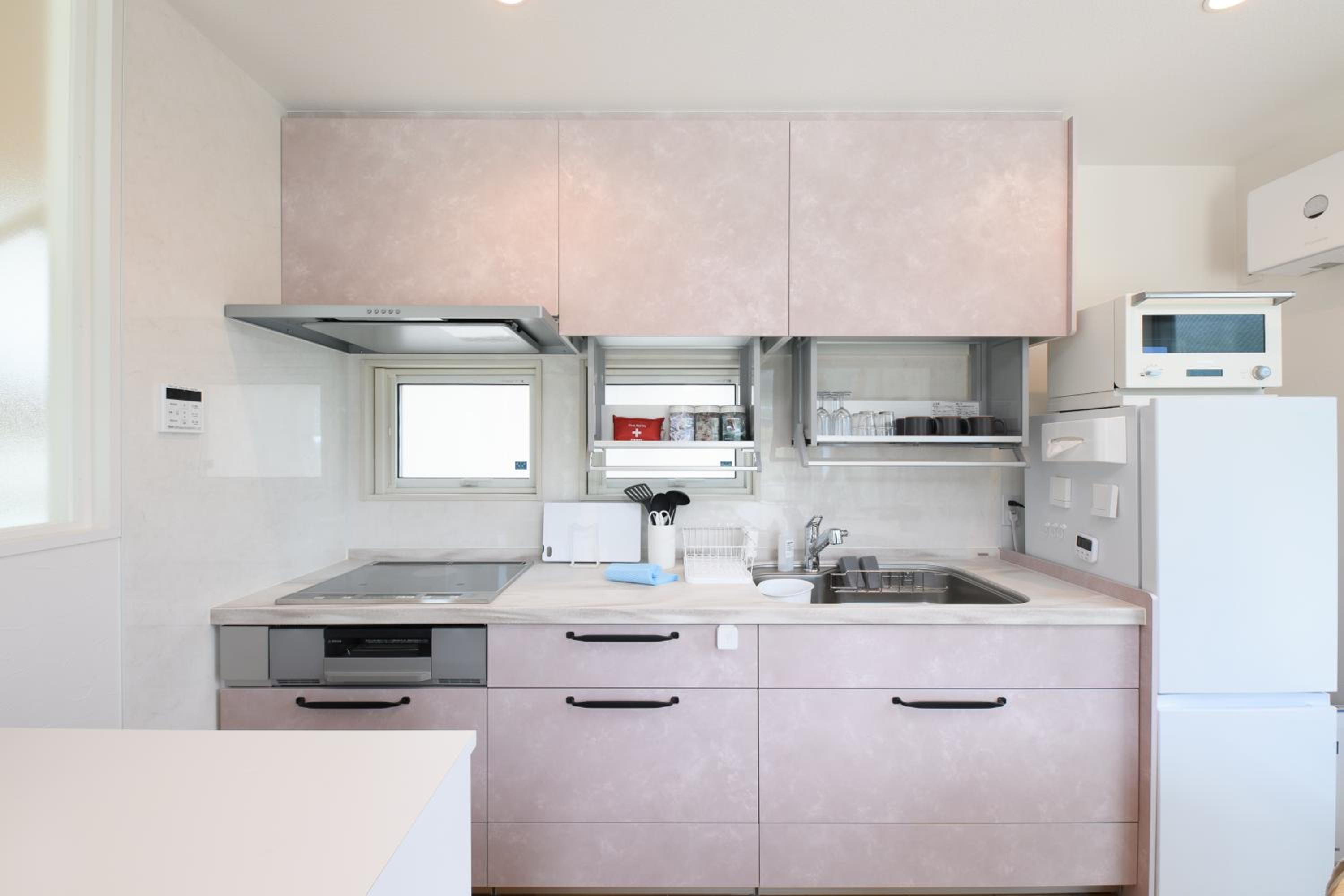 Three-Bedroom House - Photo 37