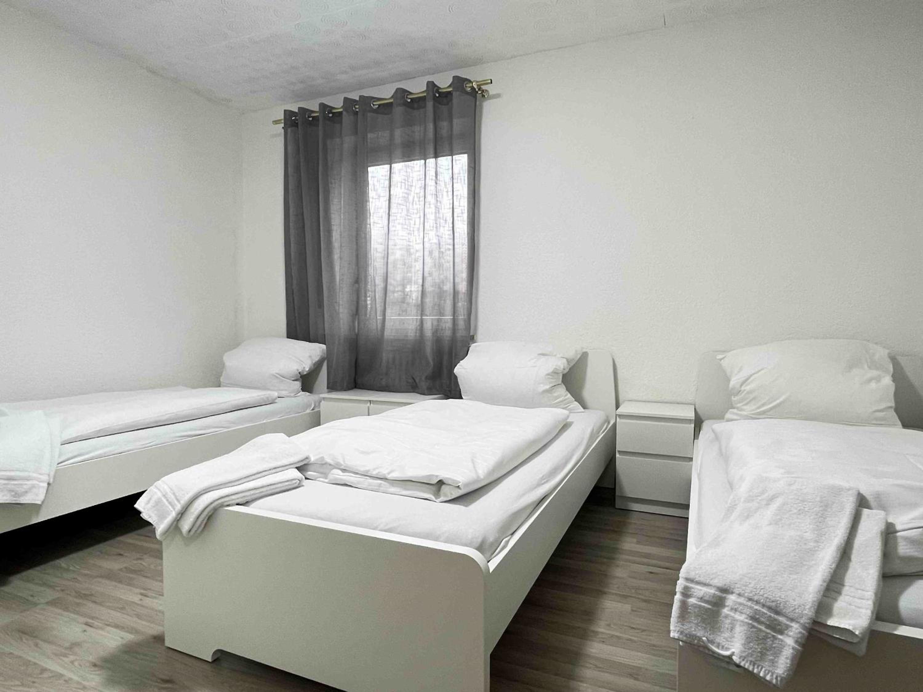 Three-Bedroom Apartment photo 3