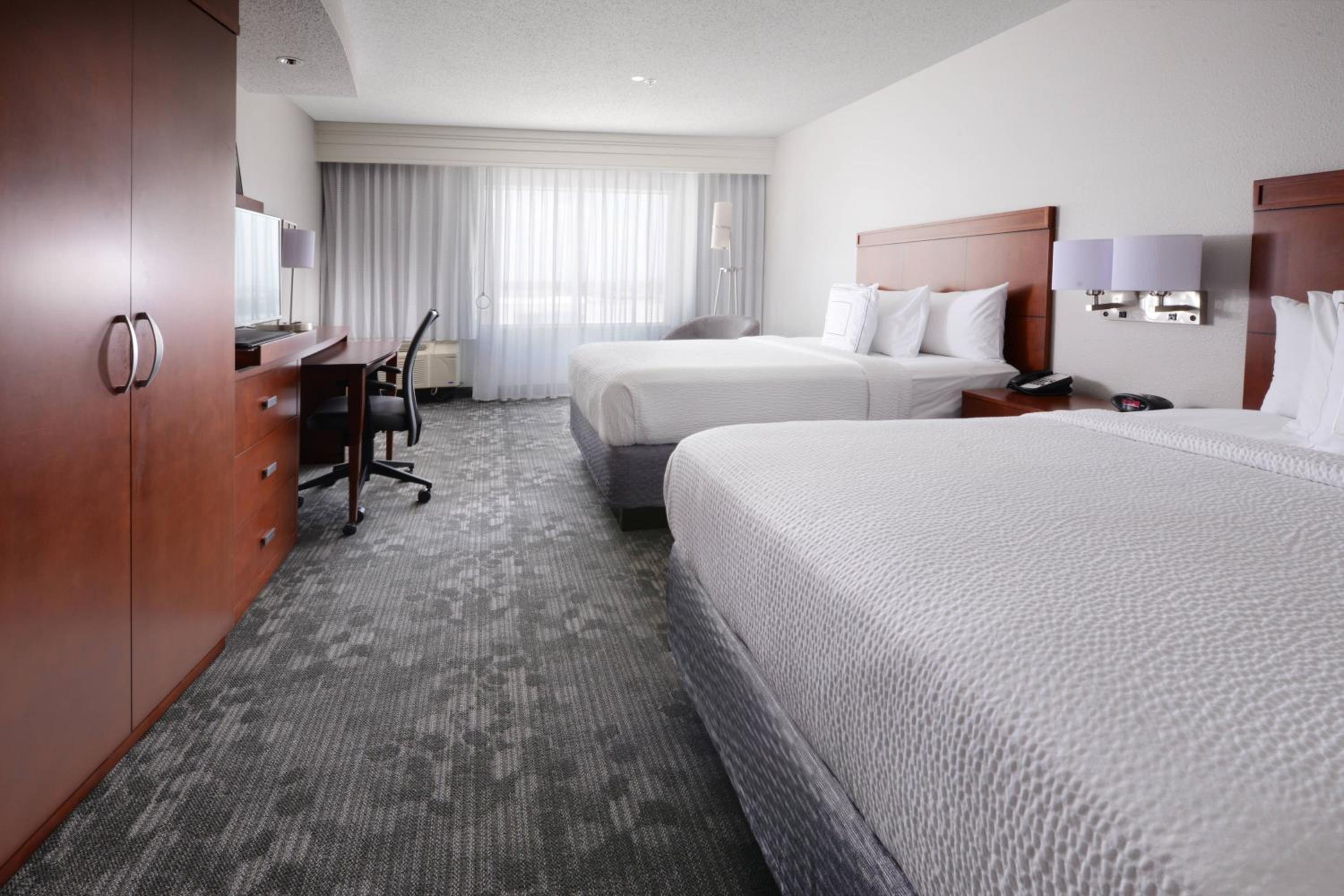Queen Room with Two Queen Beds - Photo 1