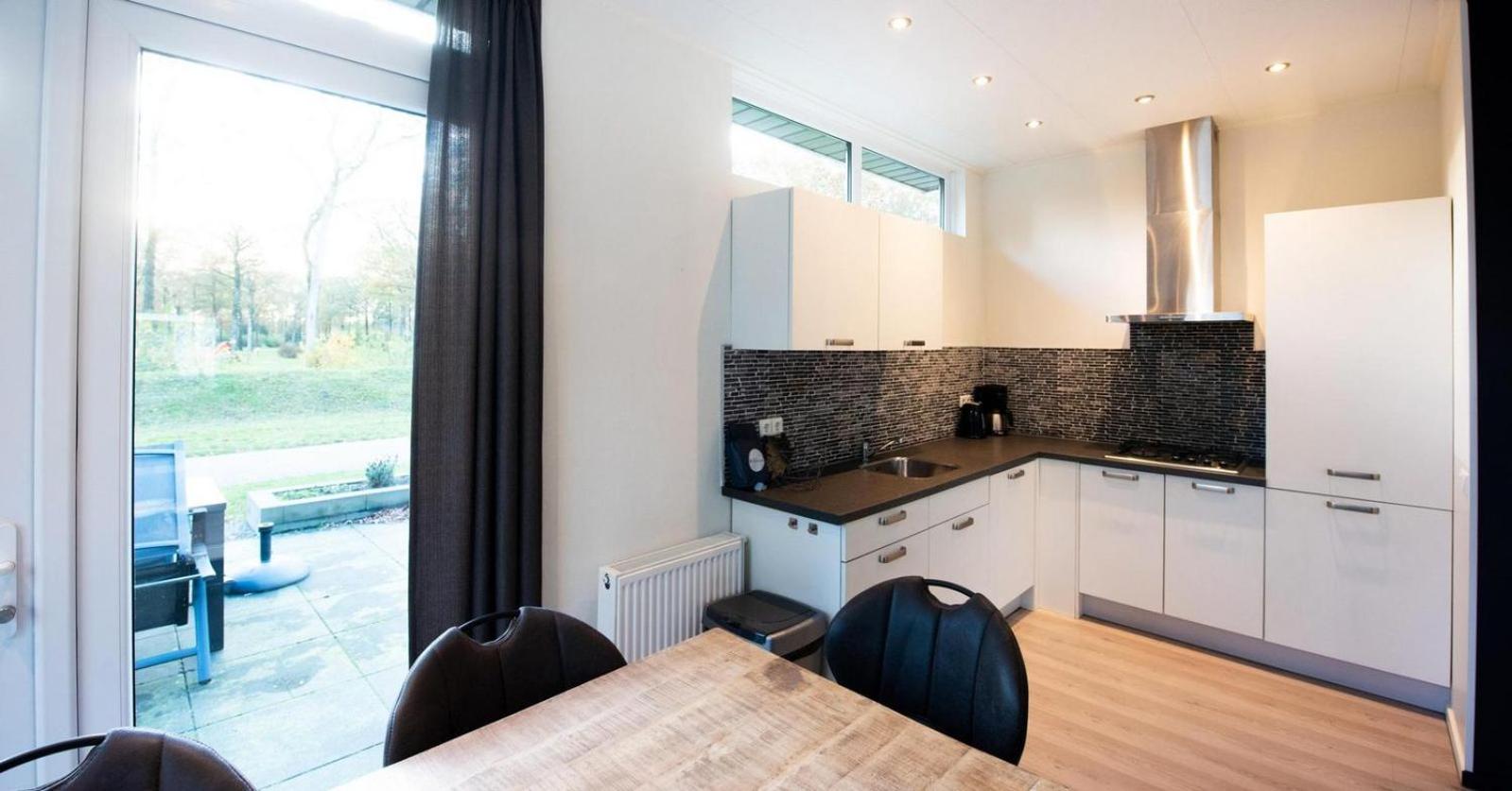 Three-Bedroom House - Photo 9