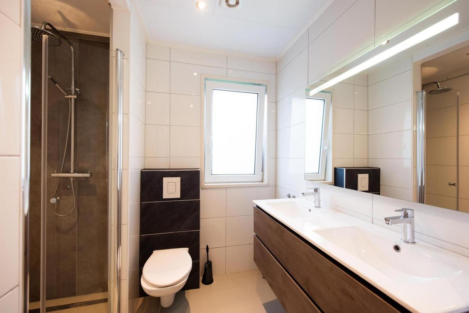 Three-Bedroom House - Photo 2