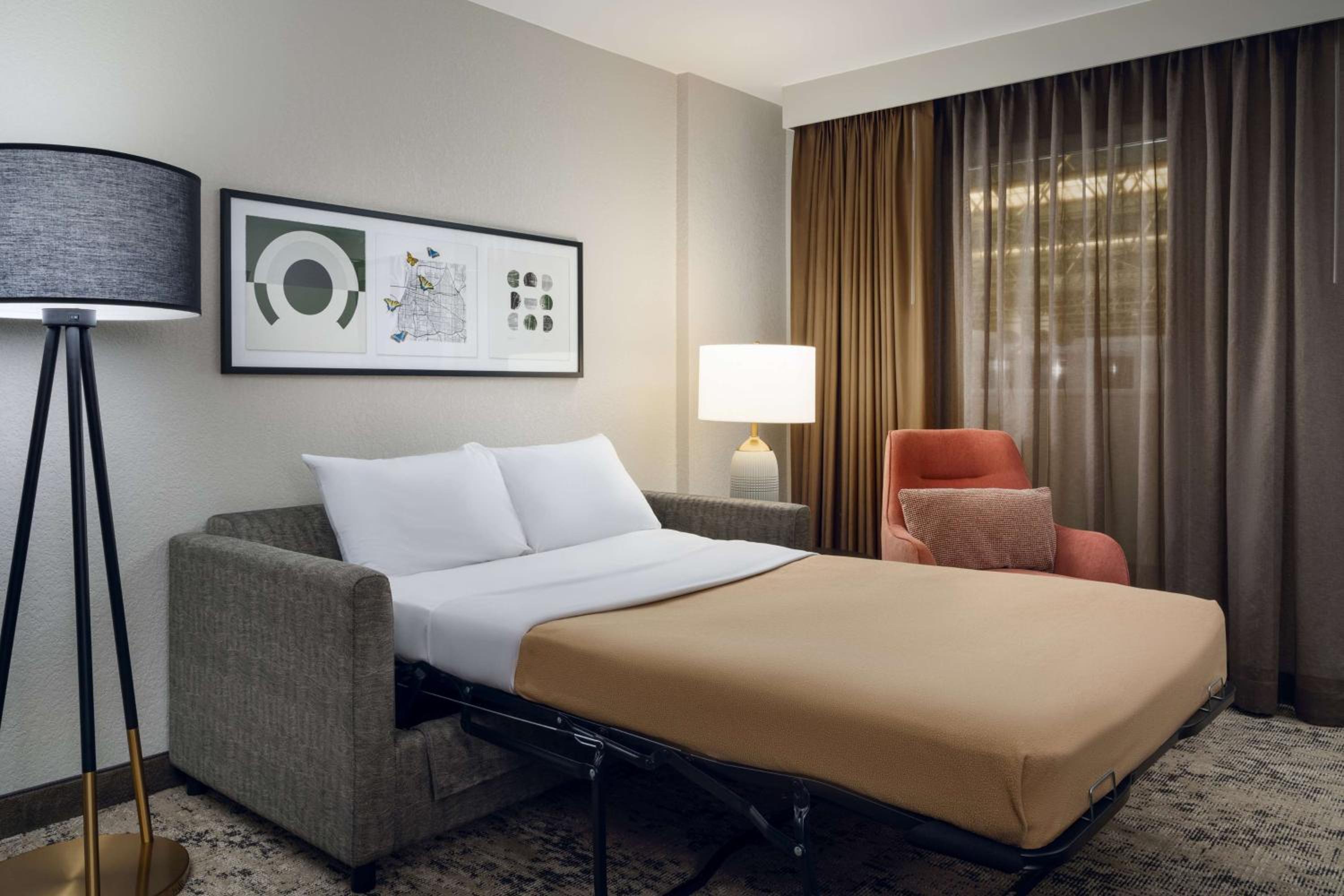 Two-Room King Suite with Bath Tub - Mobility Accessible - Photo 1