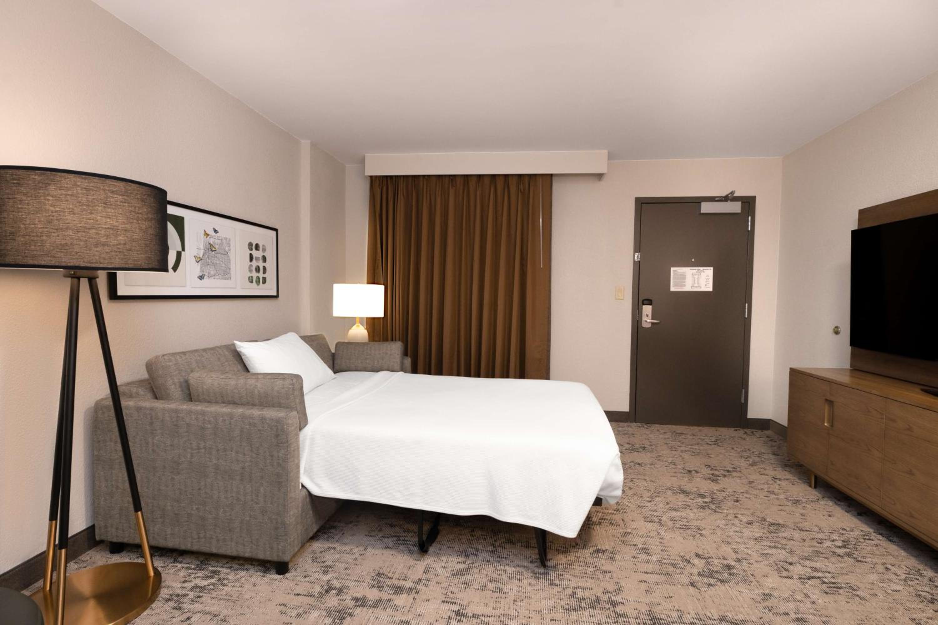 Two-Room King Suite with Sofa Bed - Photo 1