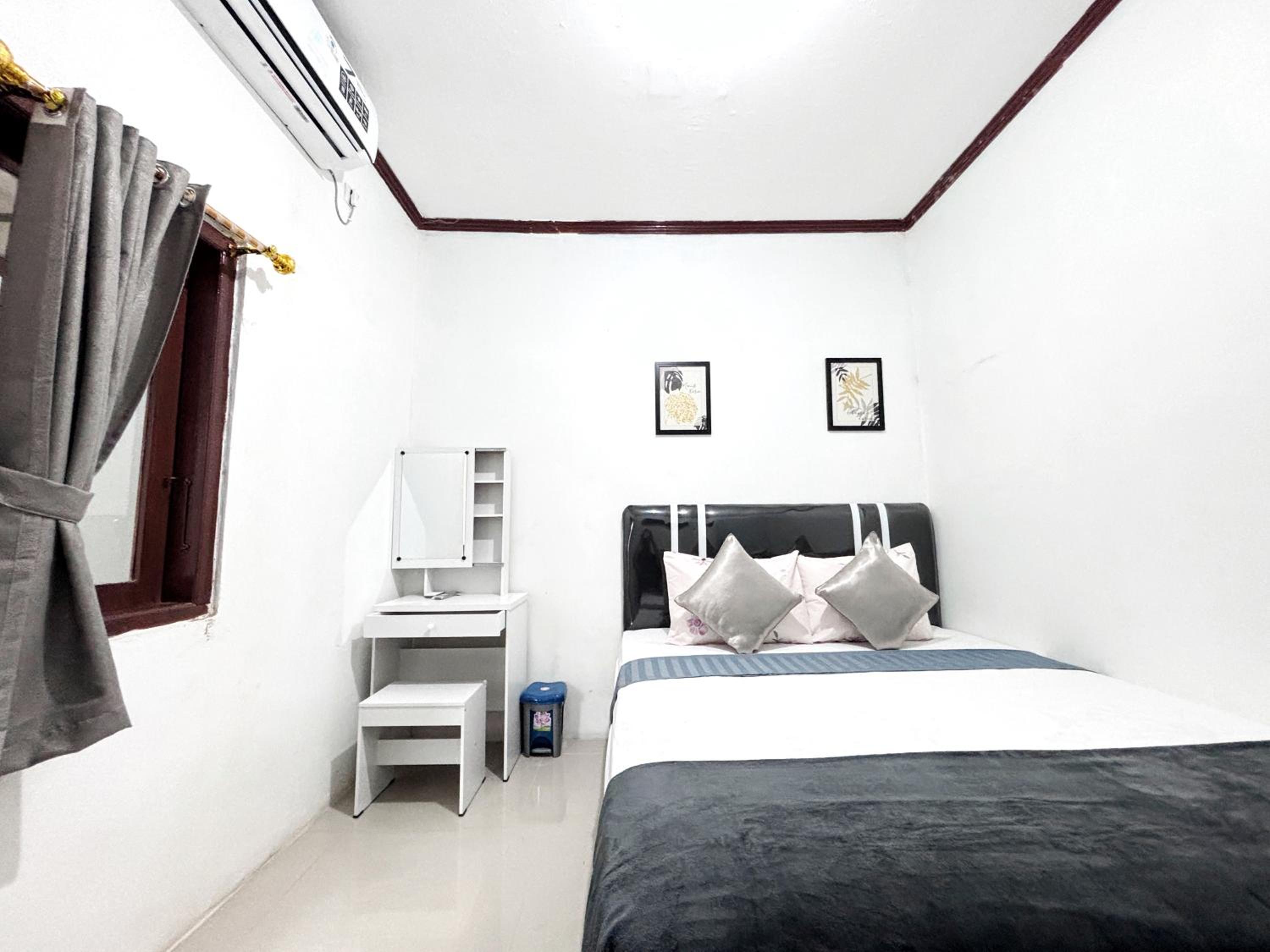 Deluxe Room - Photo 1