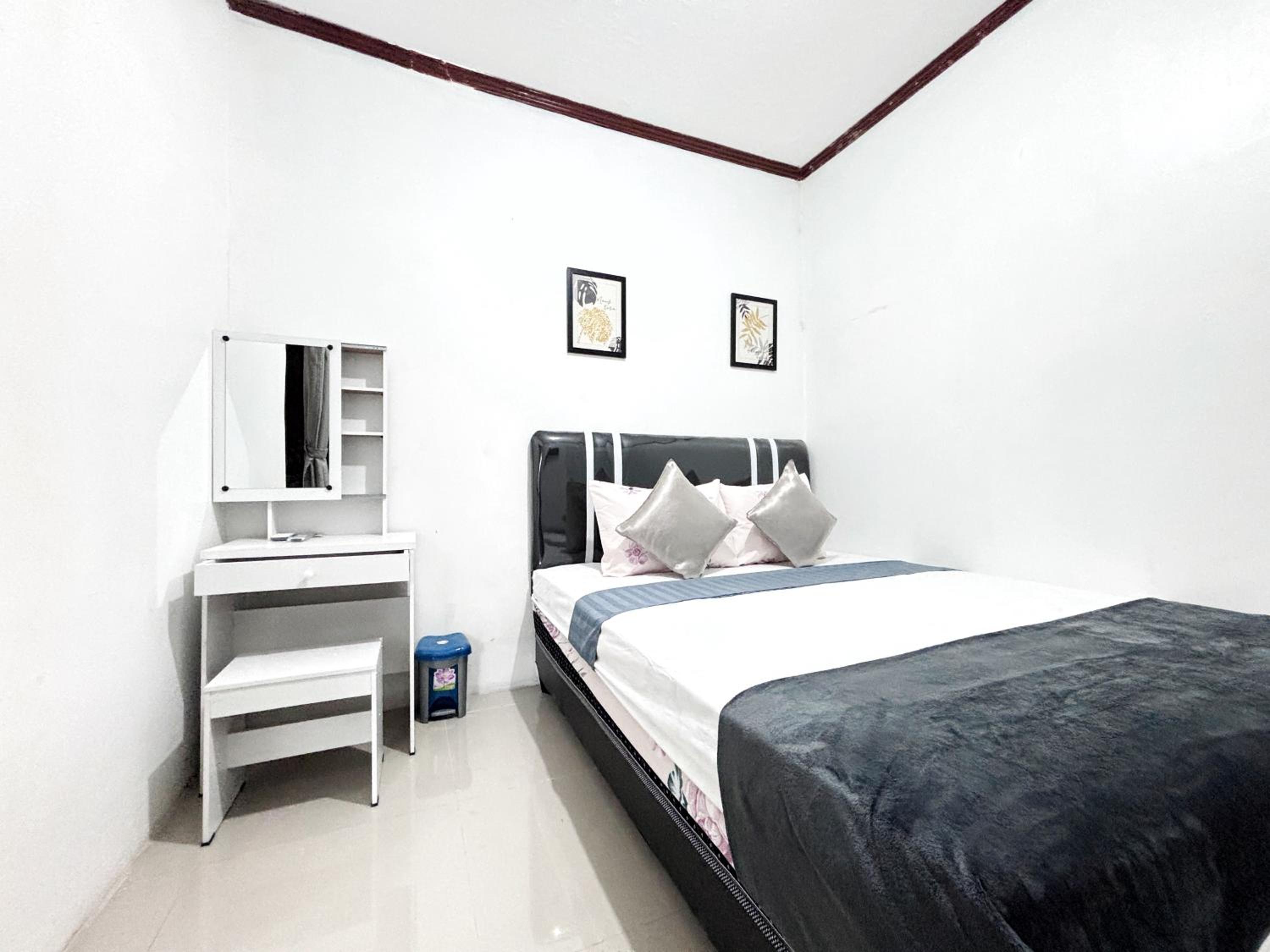 Deluxe Room - Photo 5
