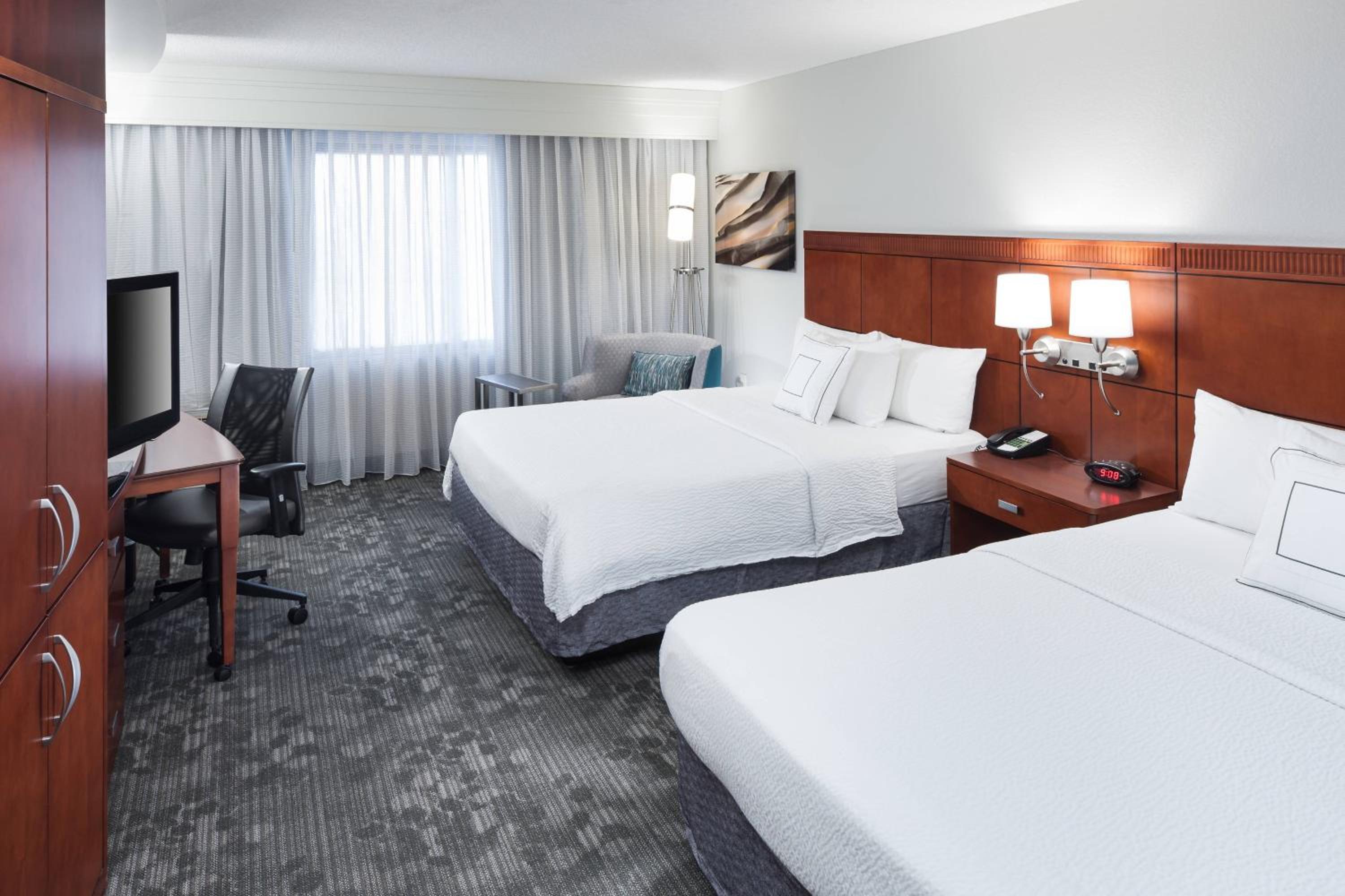 Queen Room with Two Queen Beds - Photo 1