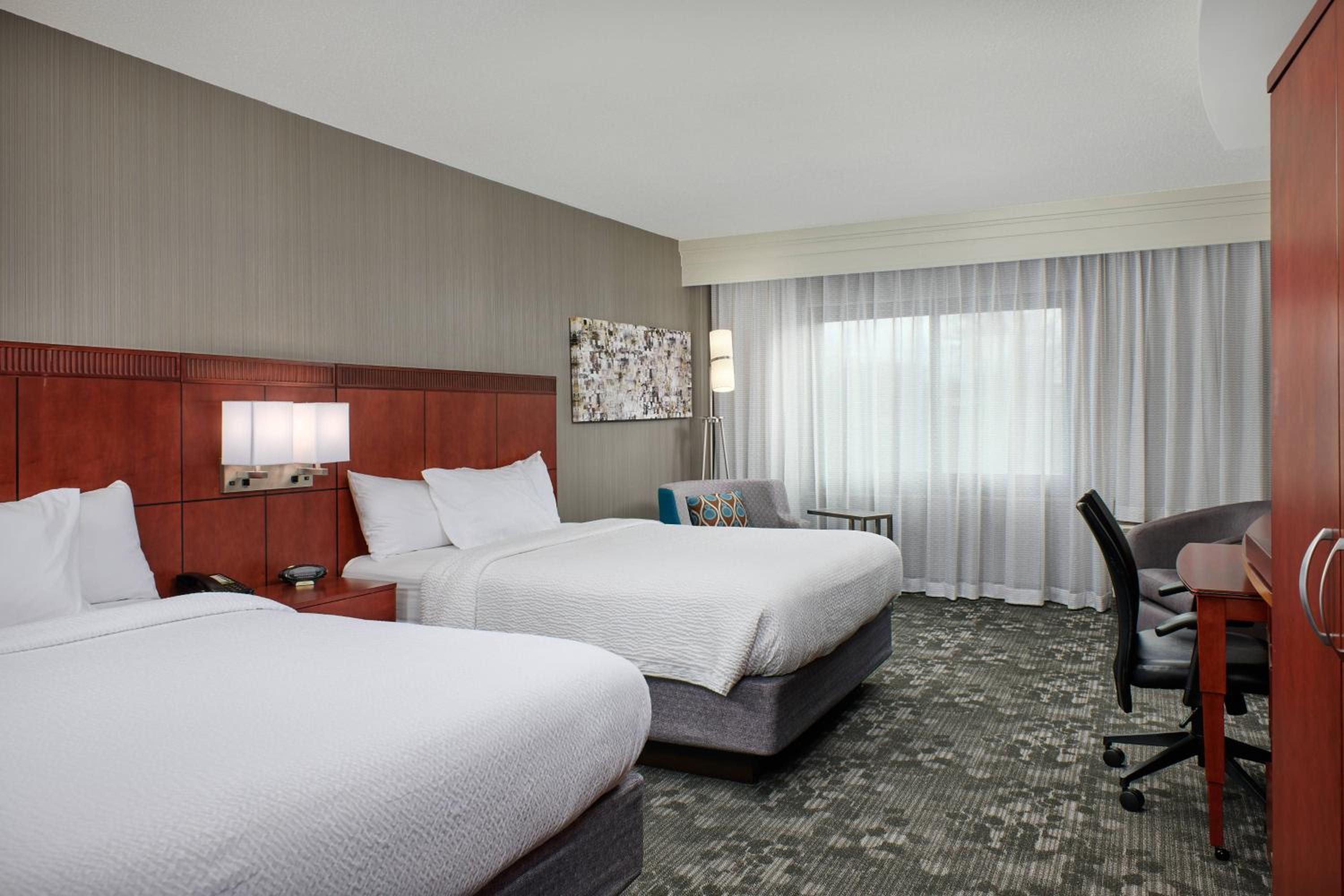 Queen Room with Two Queen Beds - Photo 1