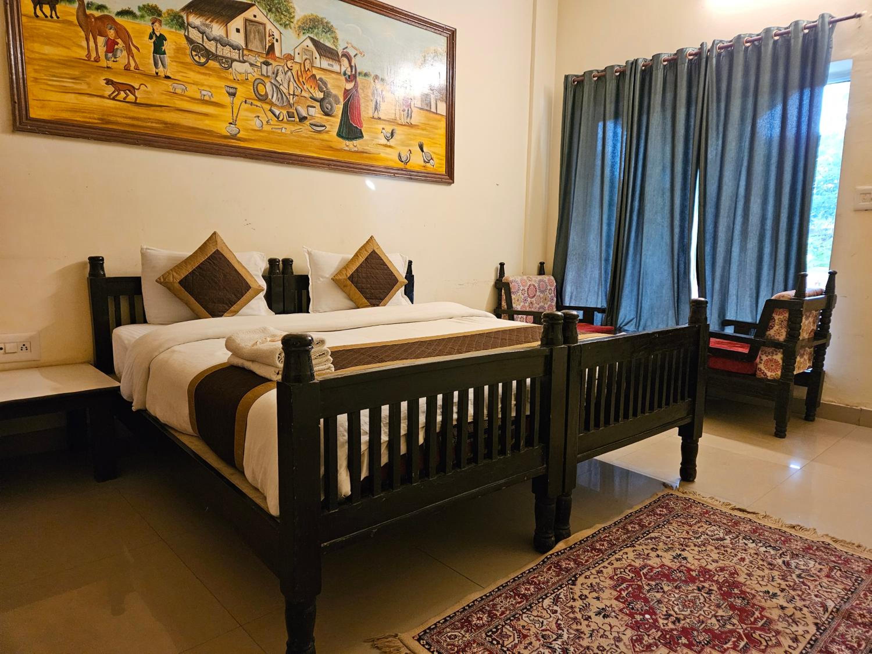 Deluxe Double Room (2 Adults + 1 Child) photo 2