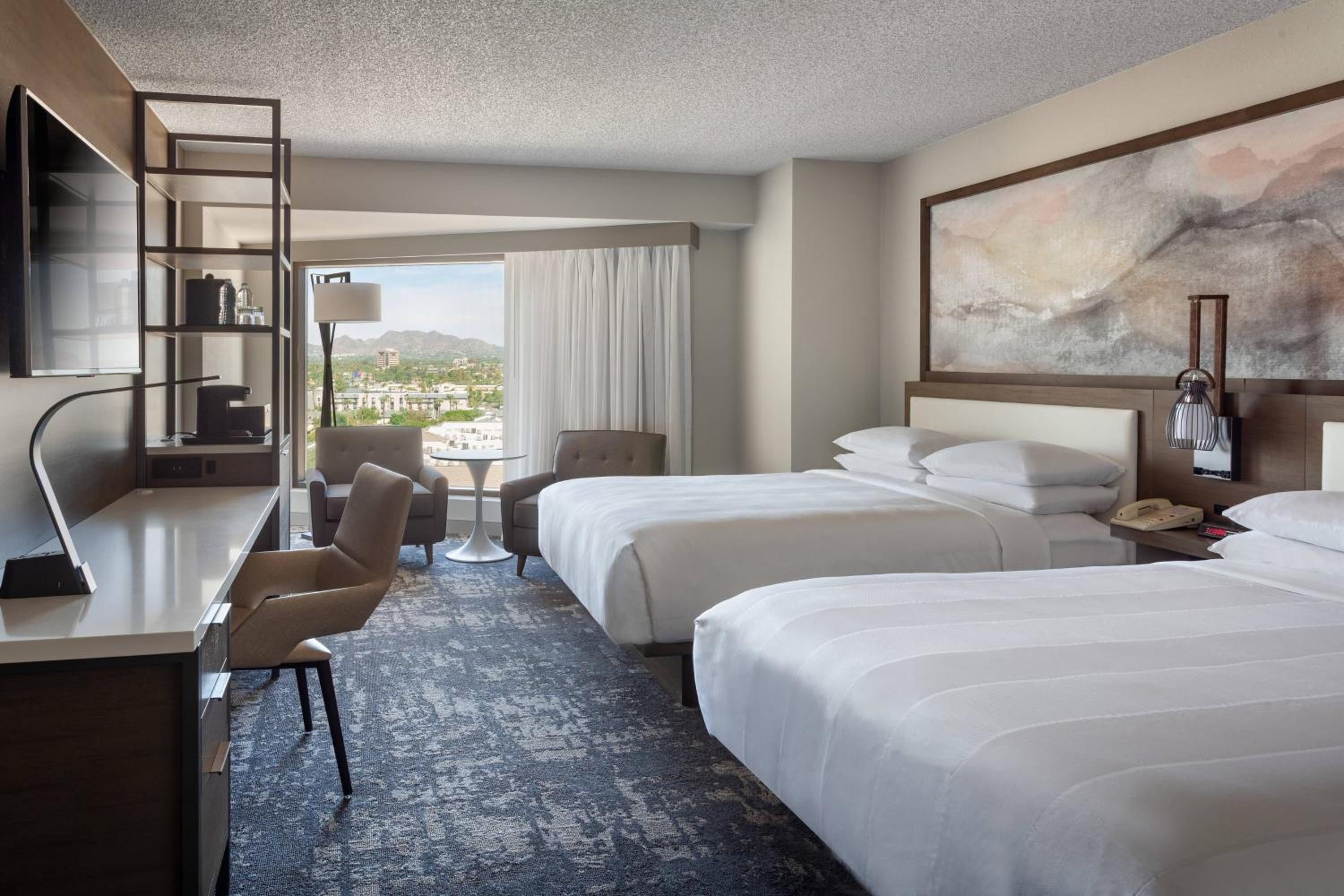 Larger Queen Room with Two Queen Beds - Photo 1