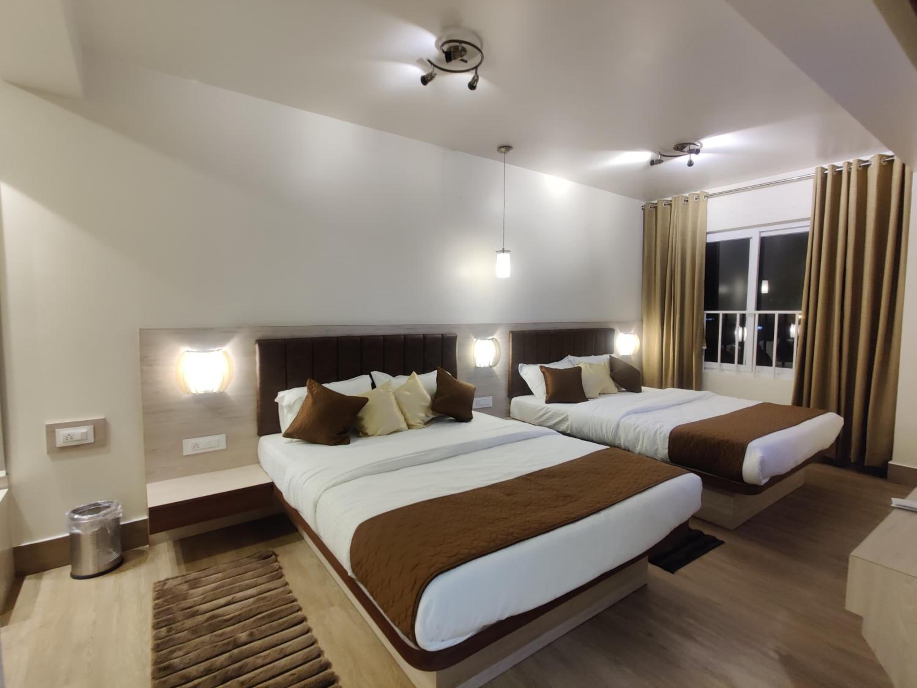 Deluxe Queen Room With Two Queen Beds photo 1