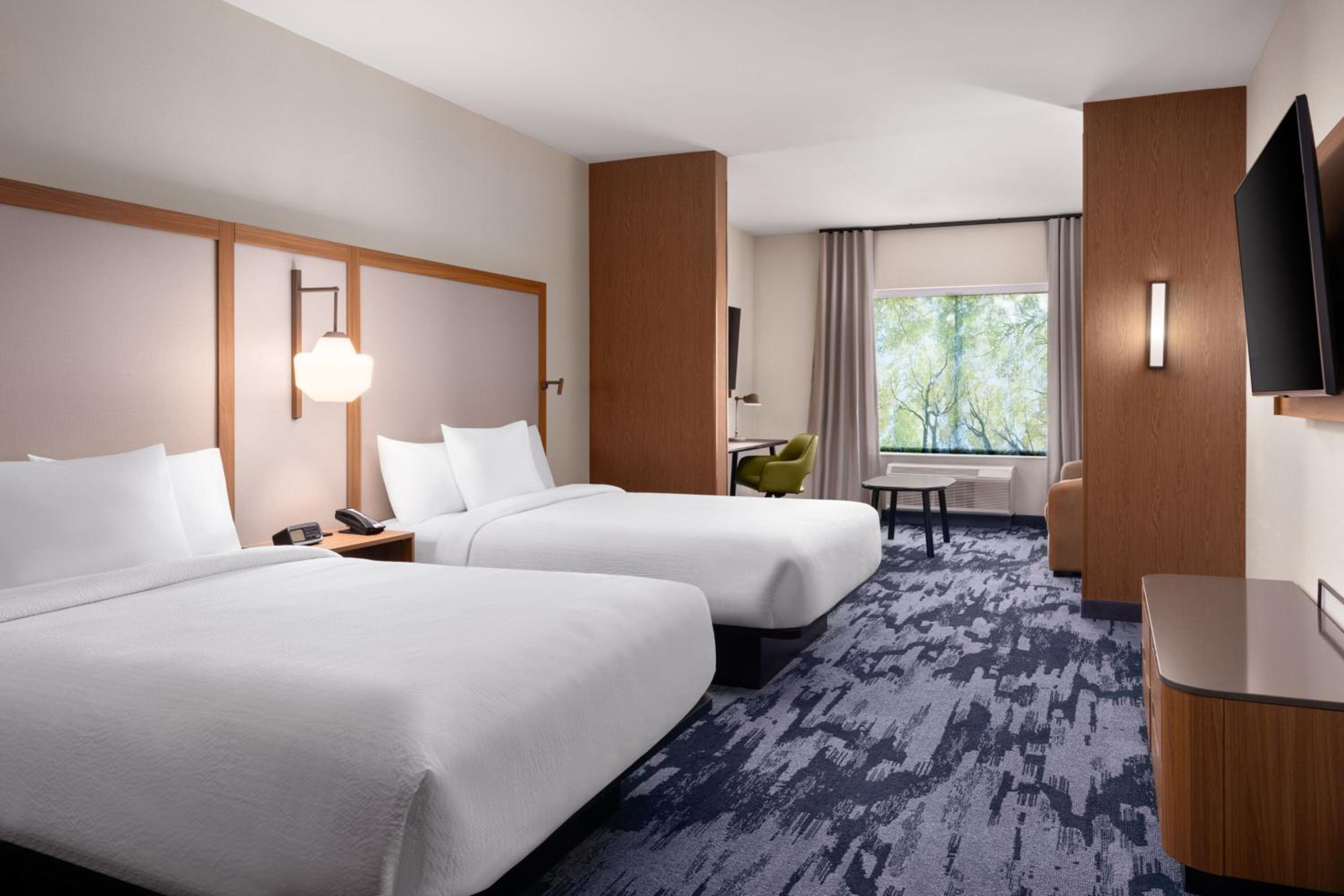 Queen Suite with Two Queen Beds and Sofa Bed