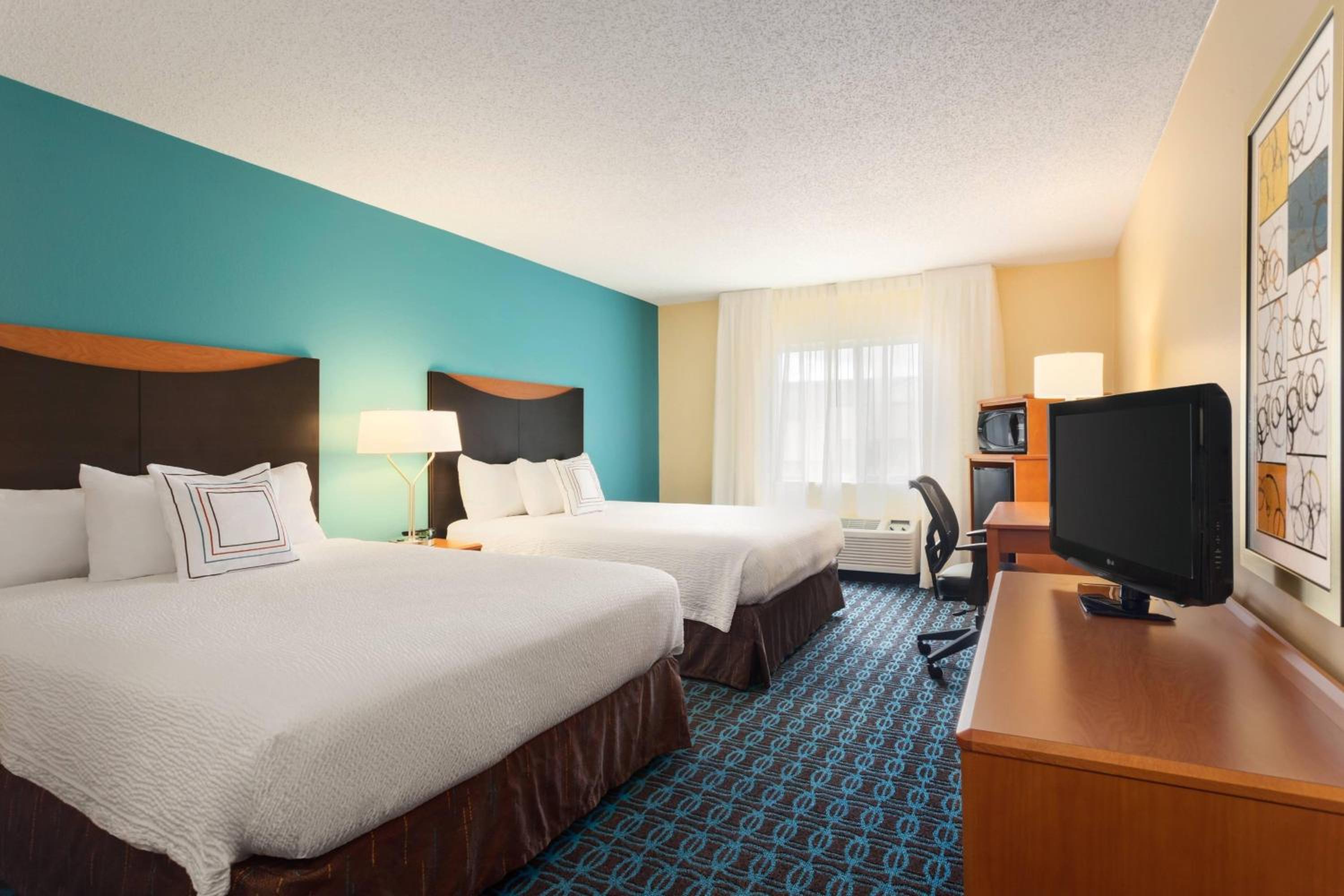 Queen Room with Two Queen Beds - Photo 1