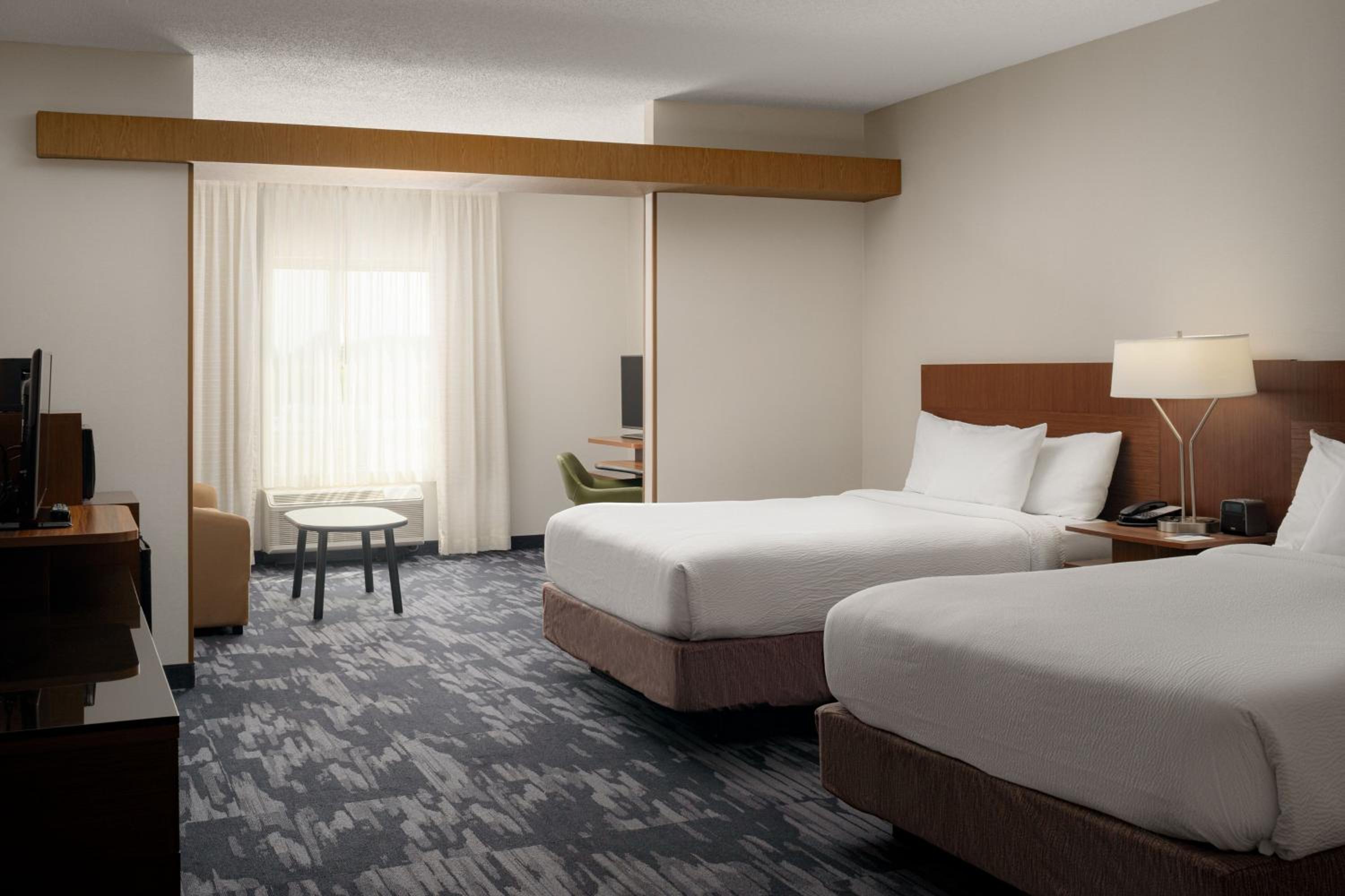 Queen Suite with Two Queen Beds and Sofa Bed photo 1