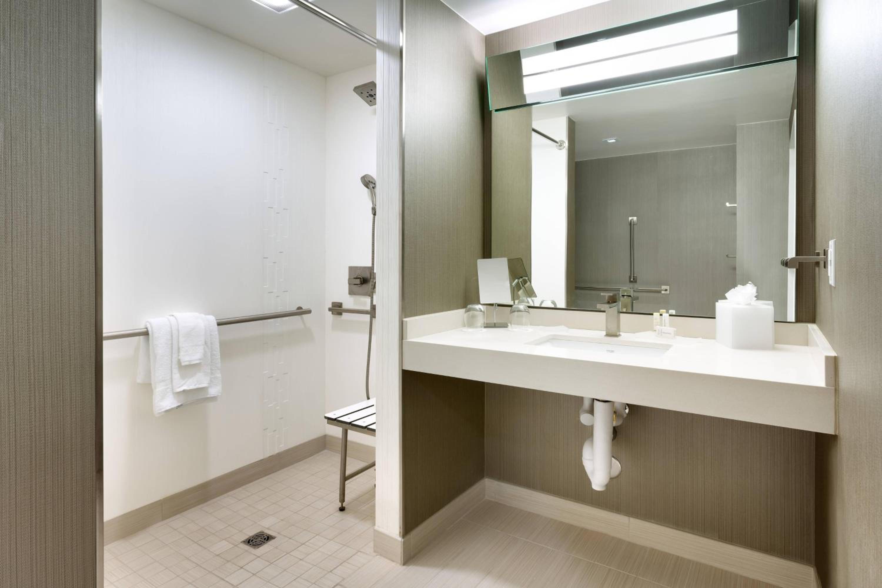 Queen Room with Two Queen Beds and Sofa Bed - Mobility Accessible with Roll-in Shower