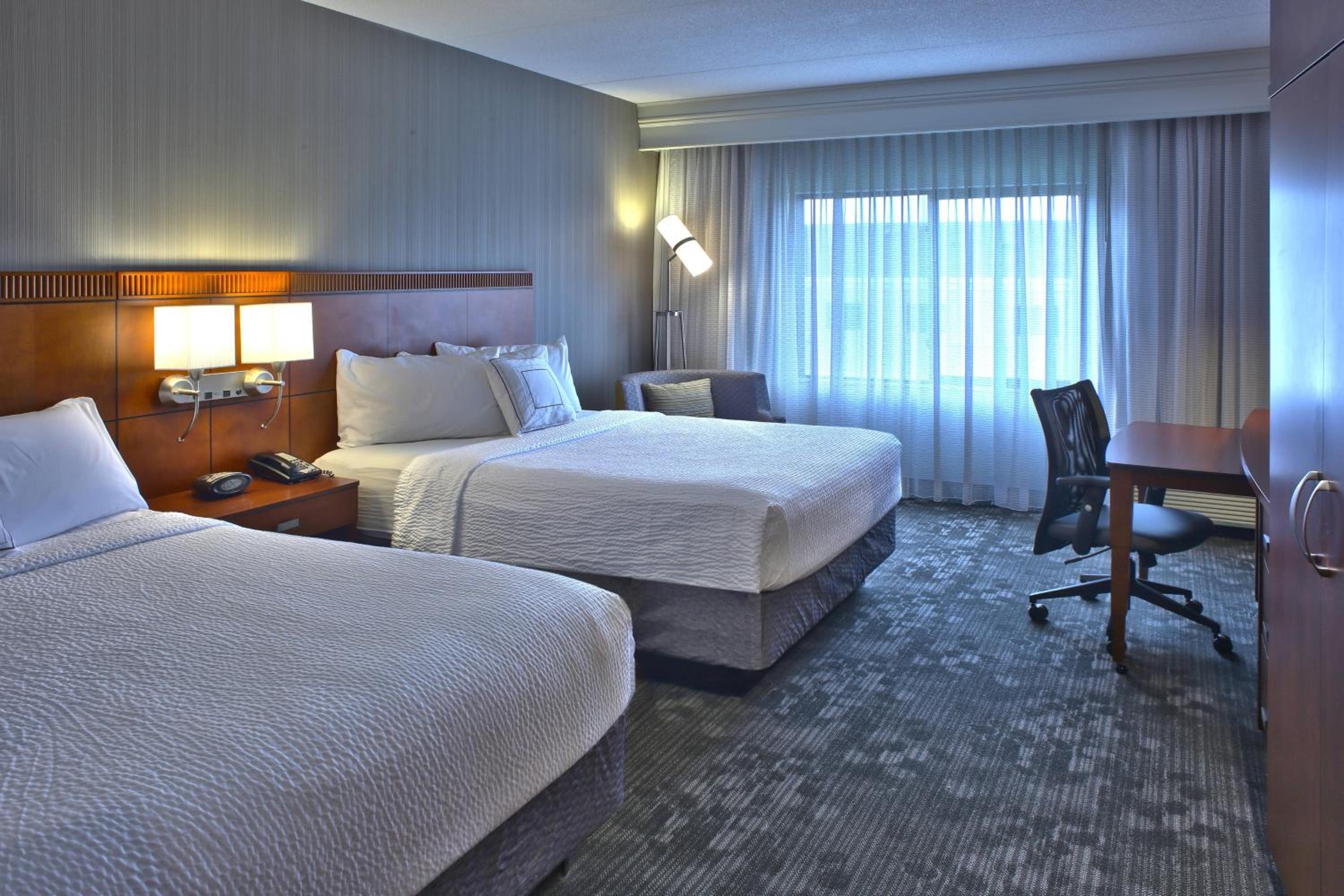 Queen Room with Two Queen Beds - Photo 1