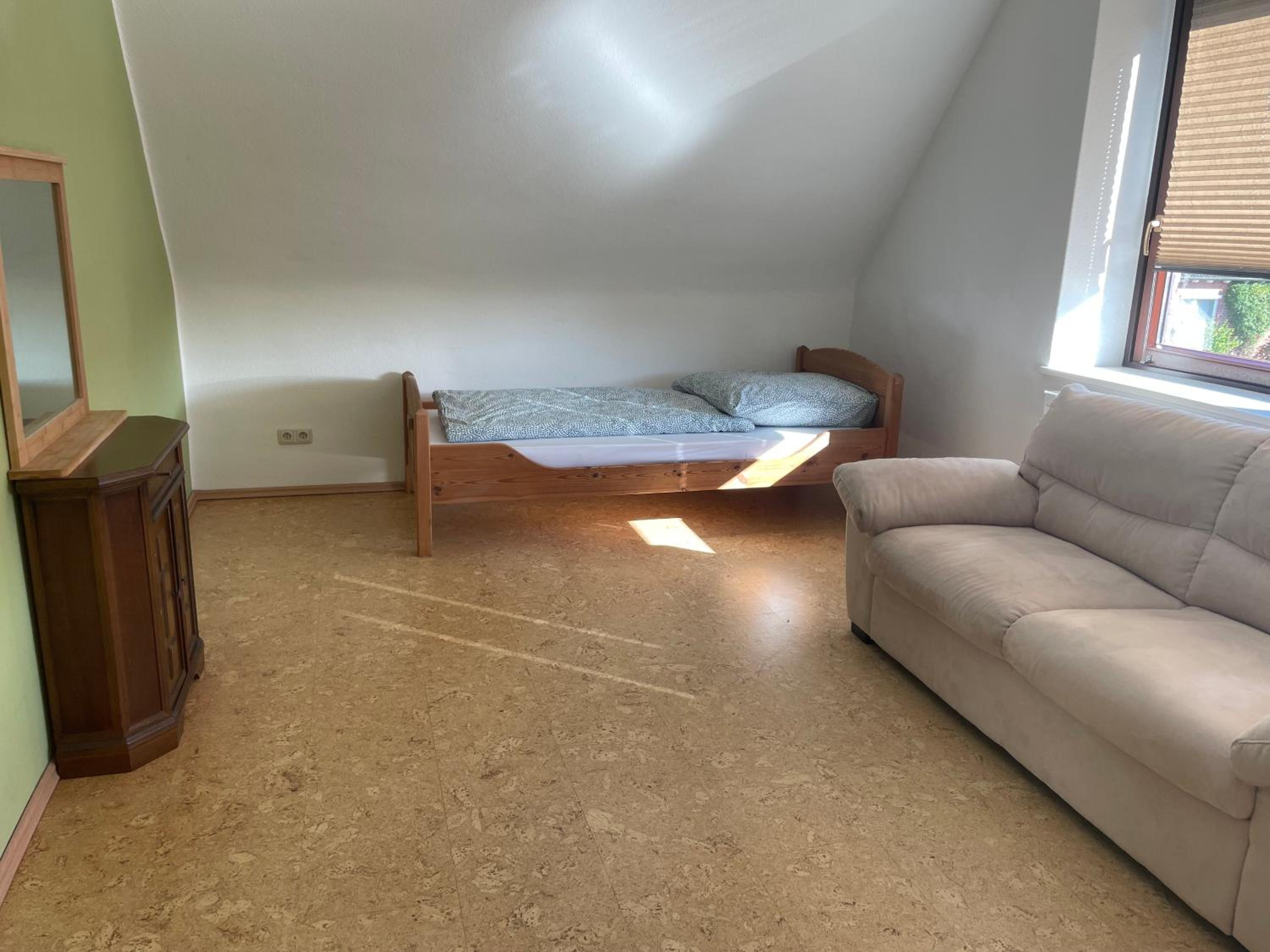 Basic Triple Room with Shared Bathroom photo 1