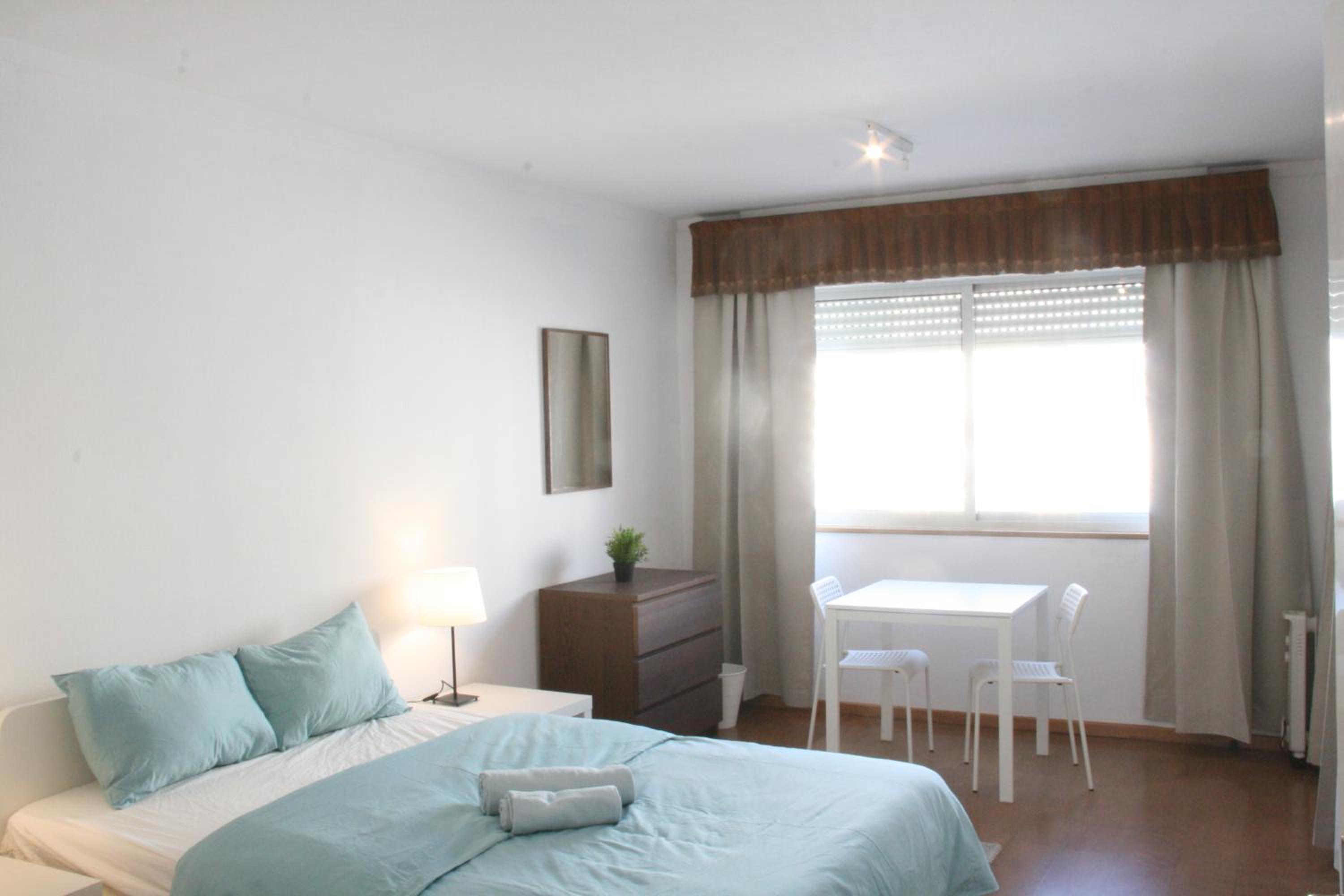 Queen Room with Shared Bathroom