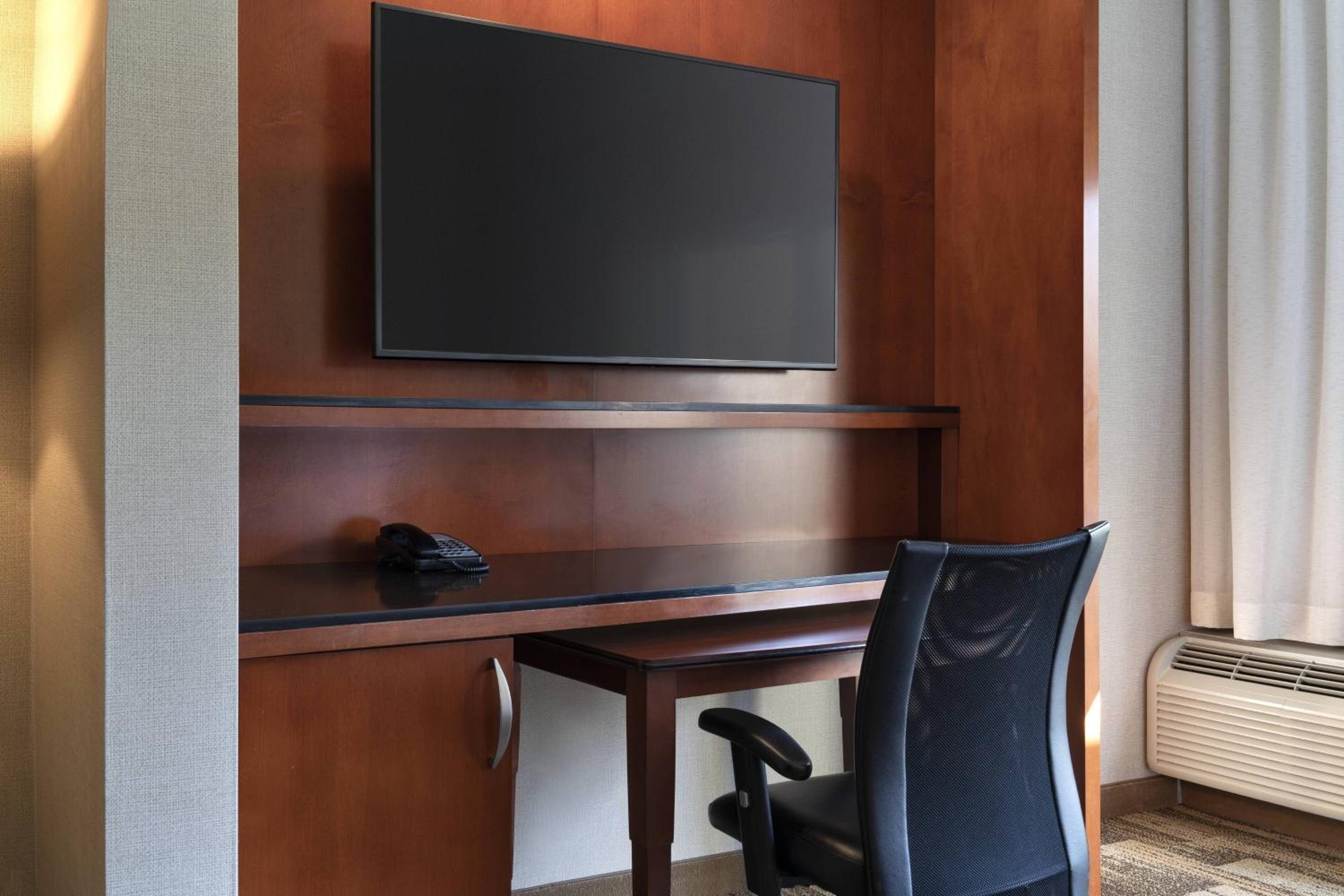 Junior King Suite with Sofa Bed and Roll-In Shower - Mobility and Hearing Accessible photo 2