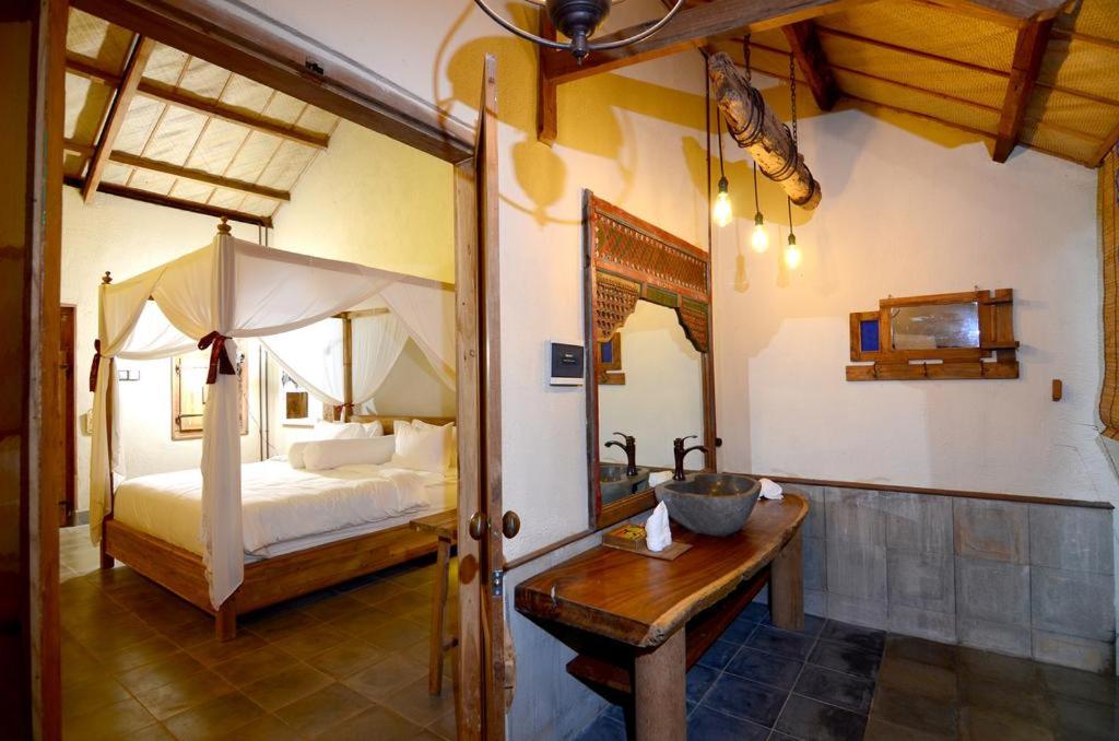 Pringgodani Standard King Room - Photo 4