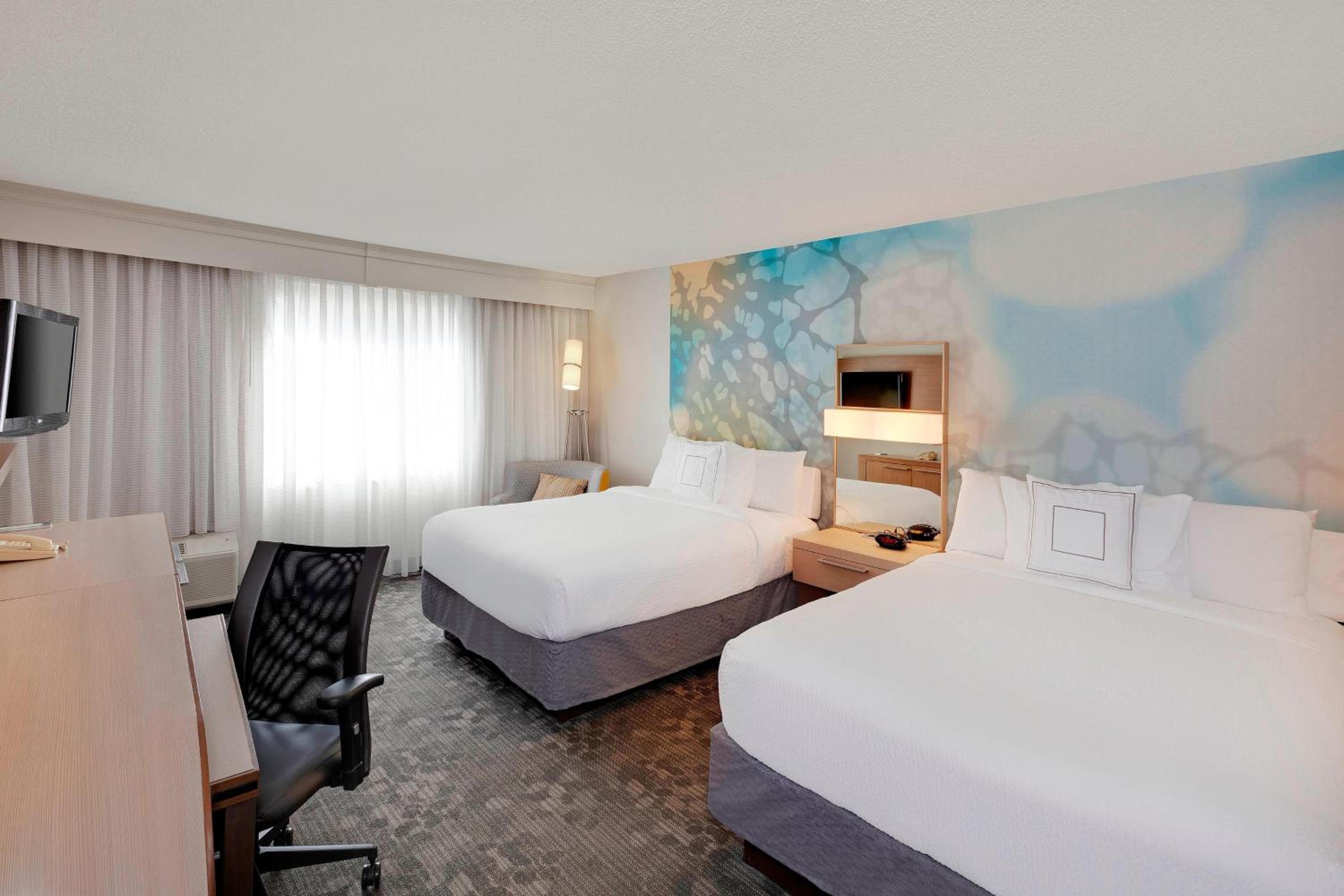 Queen Room with Two Queen Beds - Photo 1