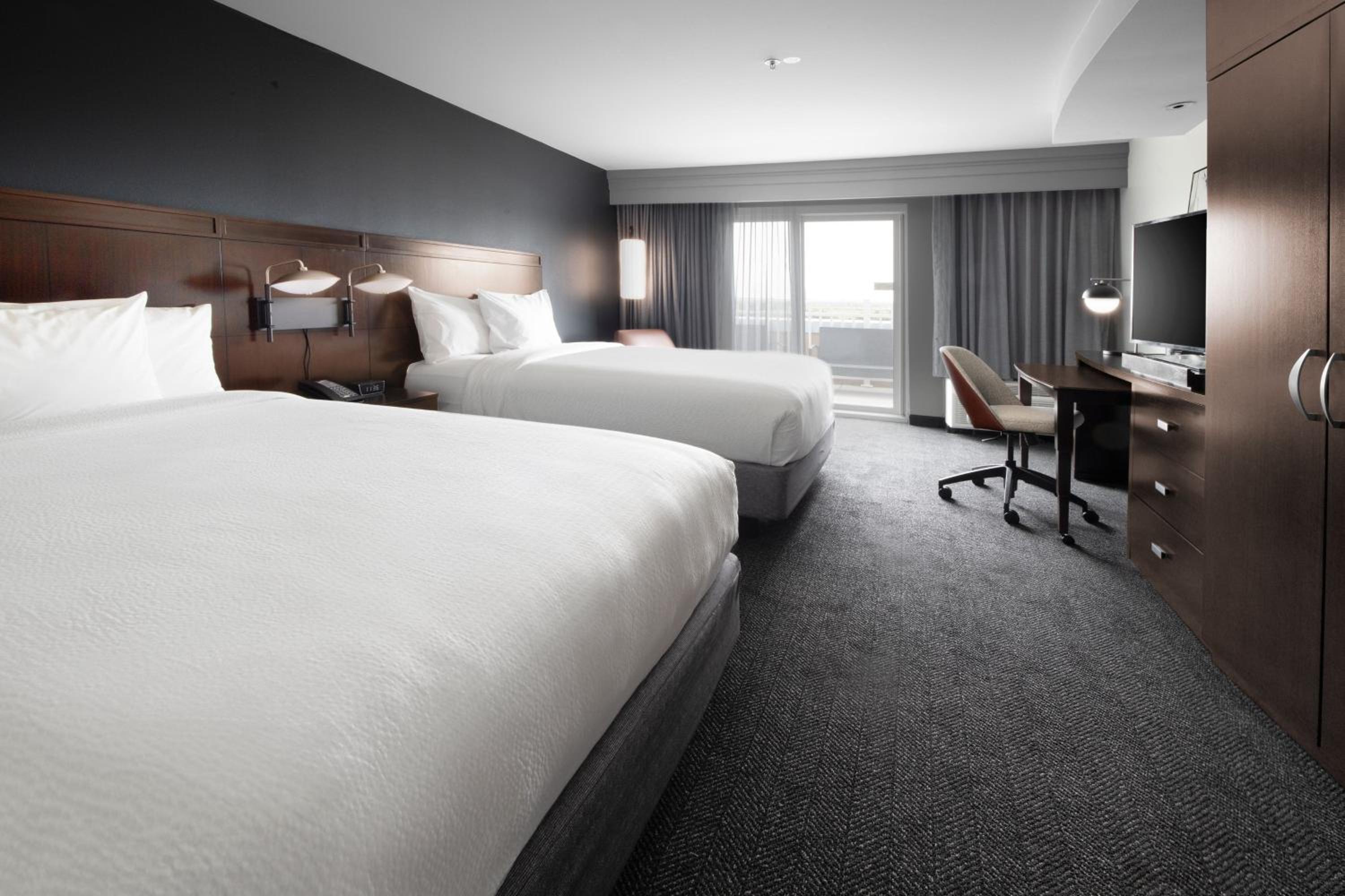 Queen Room with Two Queen Beds - Pool View photo 1