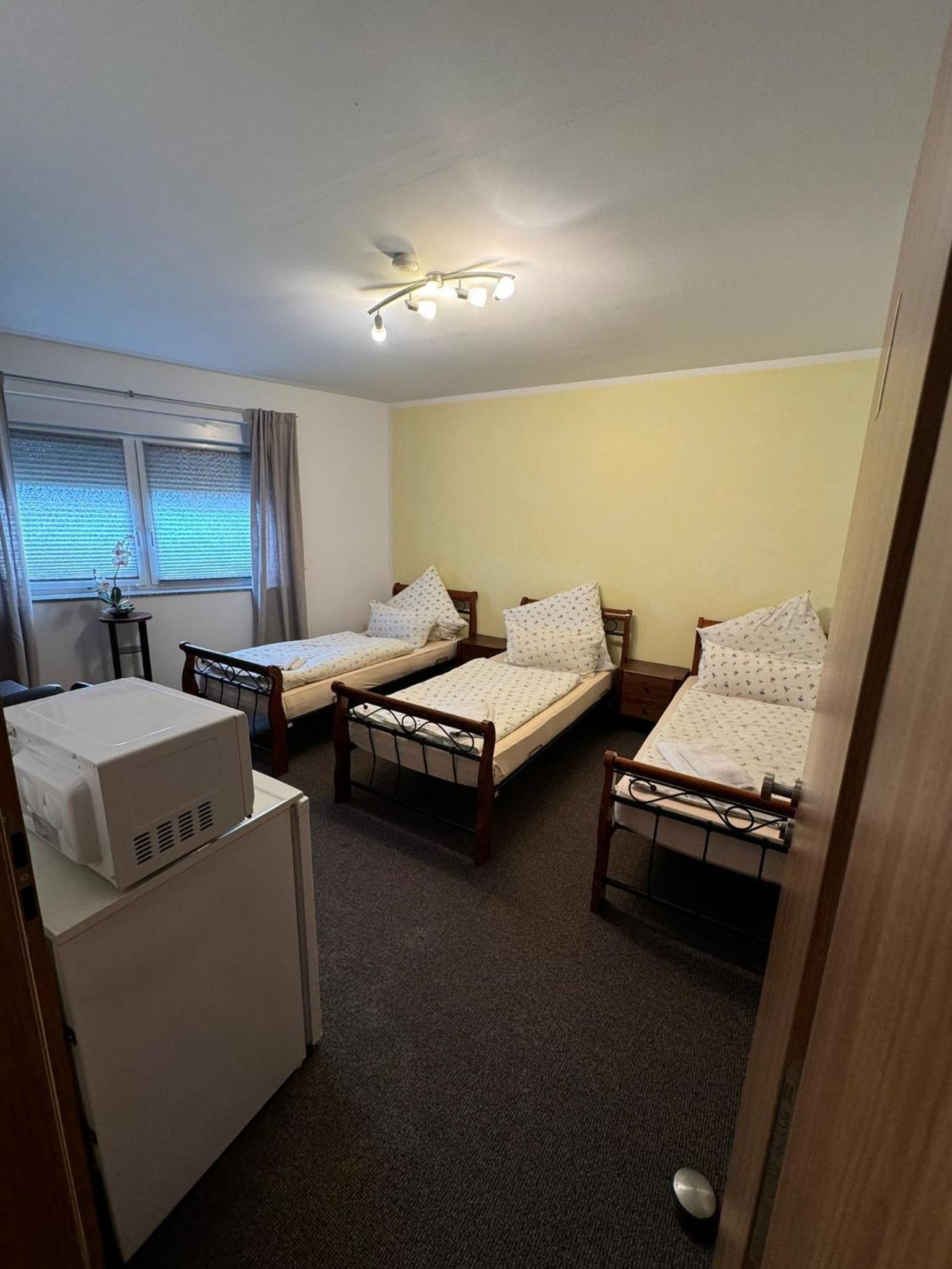 Triple Room with Private Bathroom photo 1