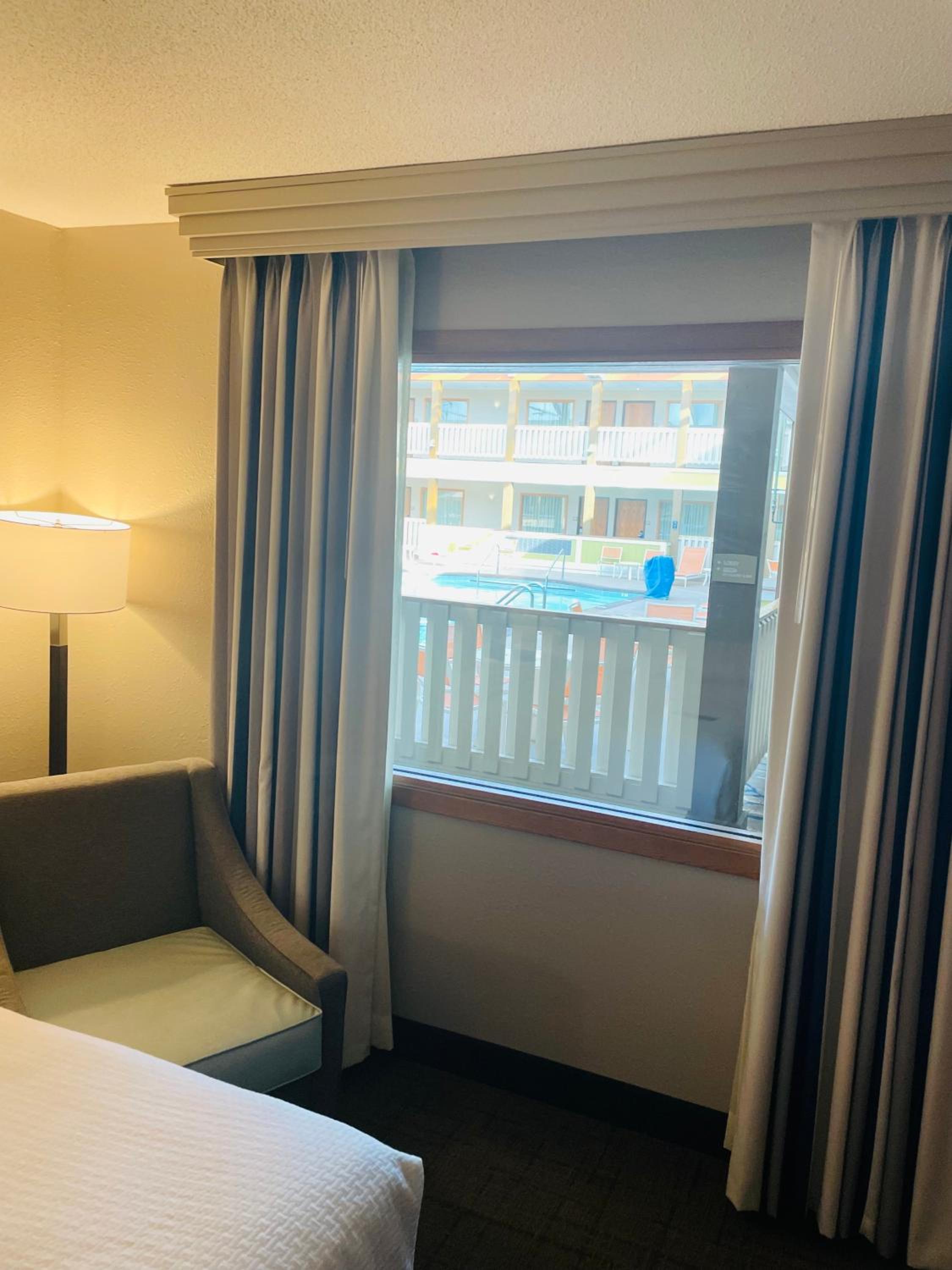 Queen Room with Two Queen Beds and Pool View - First Floor/Non-Smoking - Photo 1