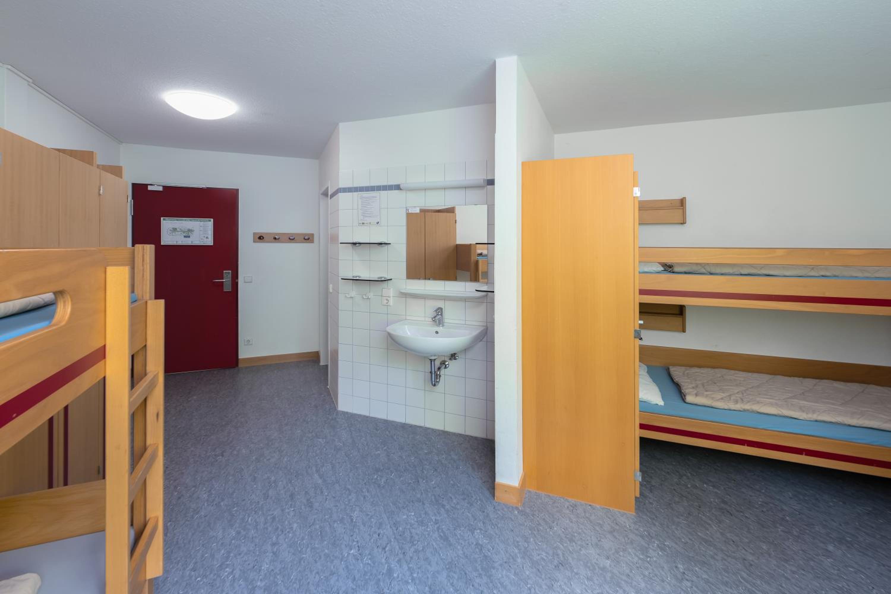 Single Bed in Male Dormitory Room photo 1