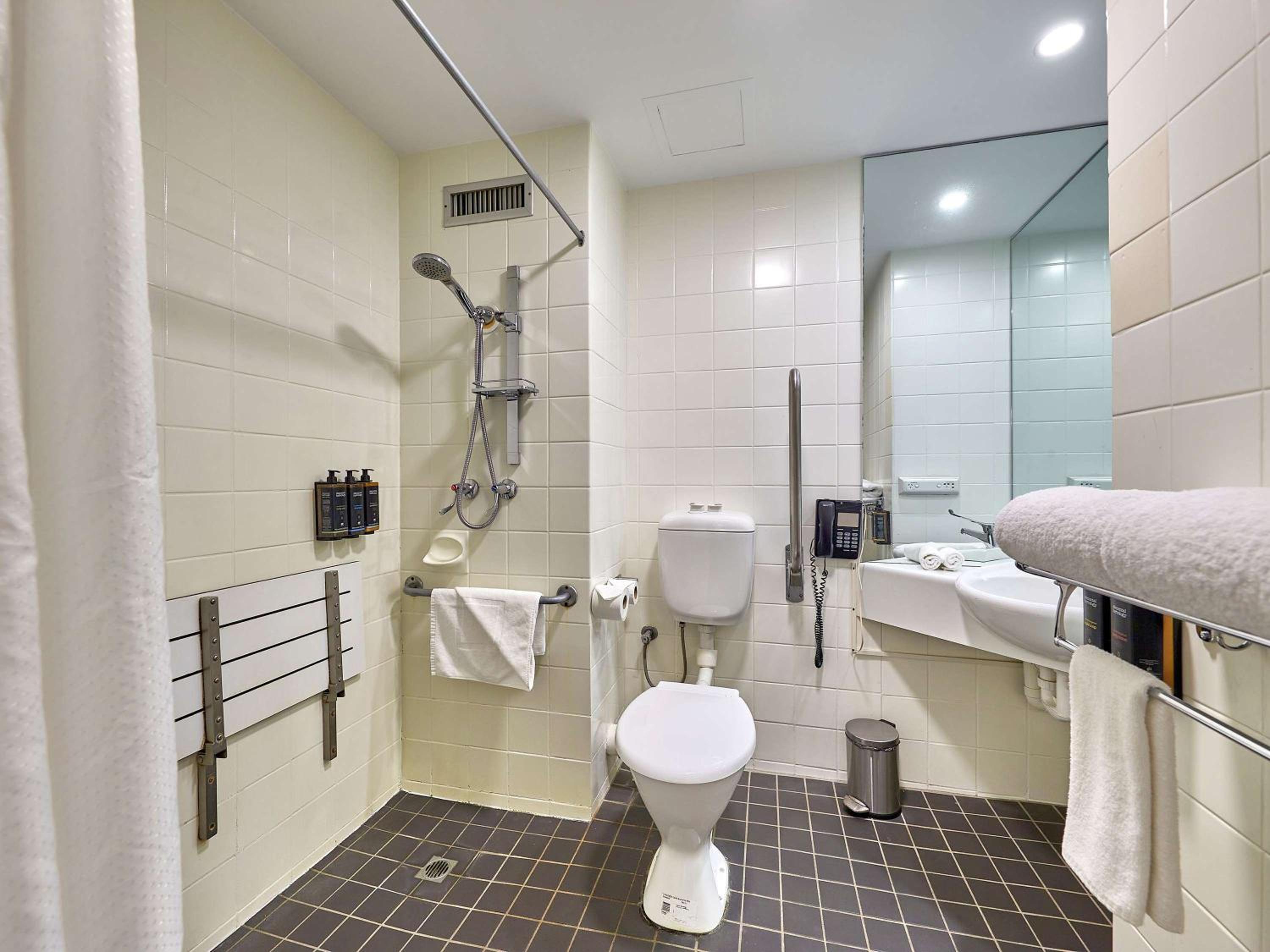 Deluxe Accessible King Room with Balcony - Photo 11