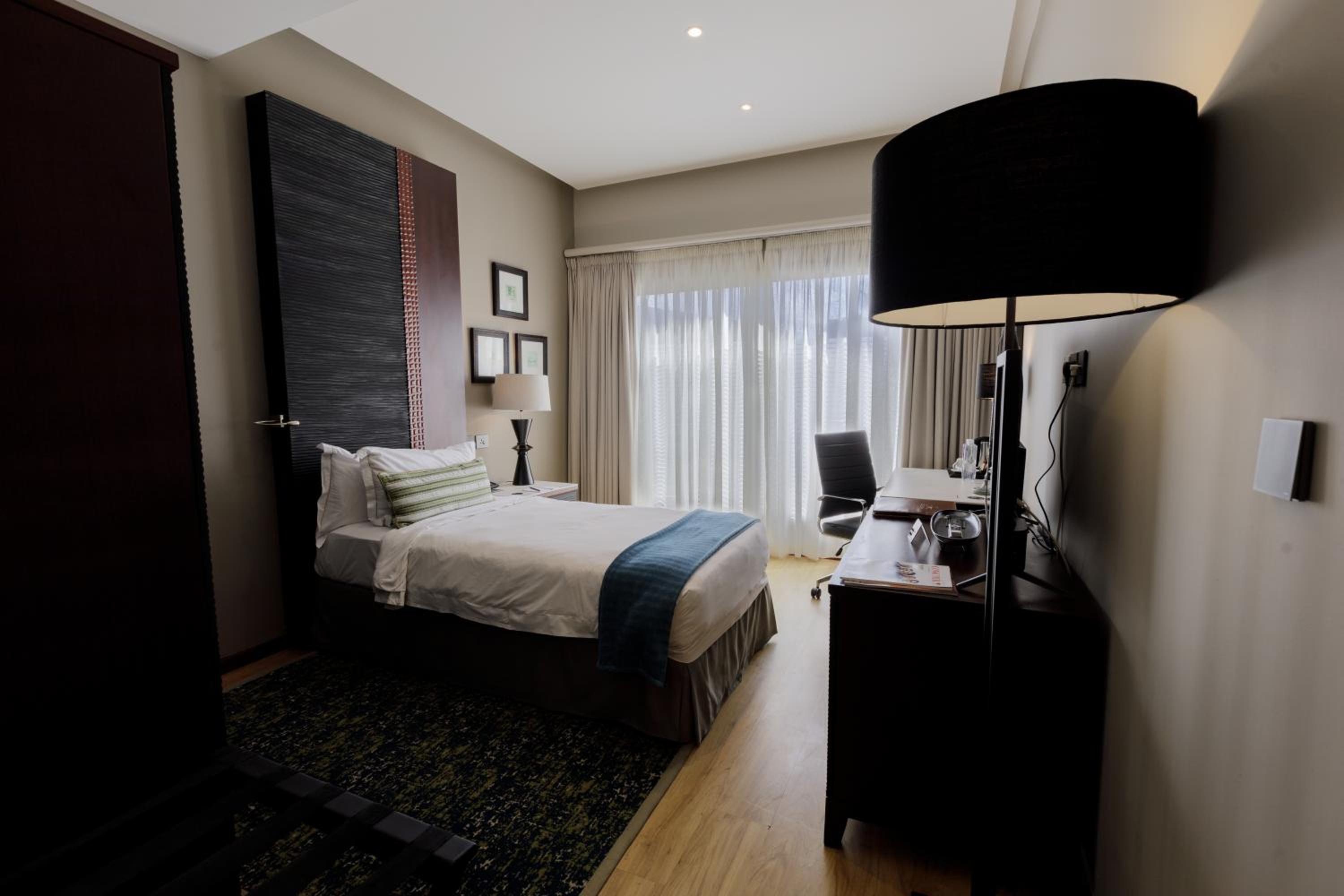 Deluxe Room with City View - Photo 2