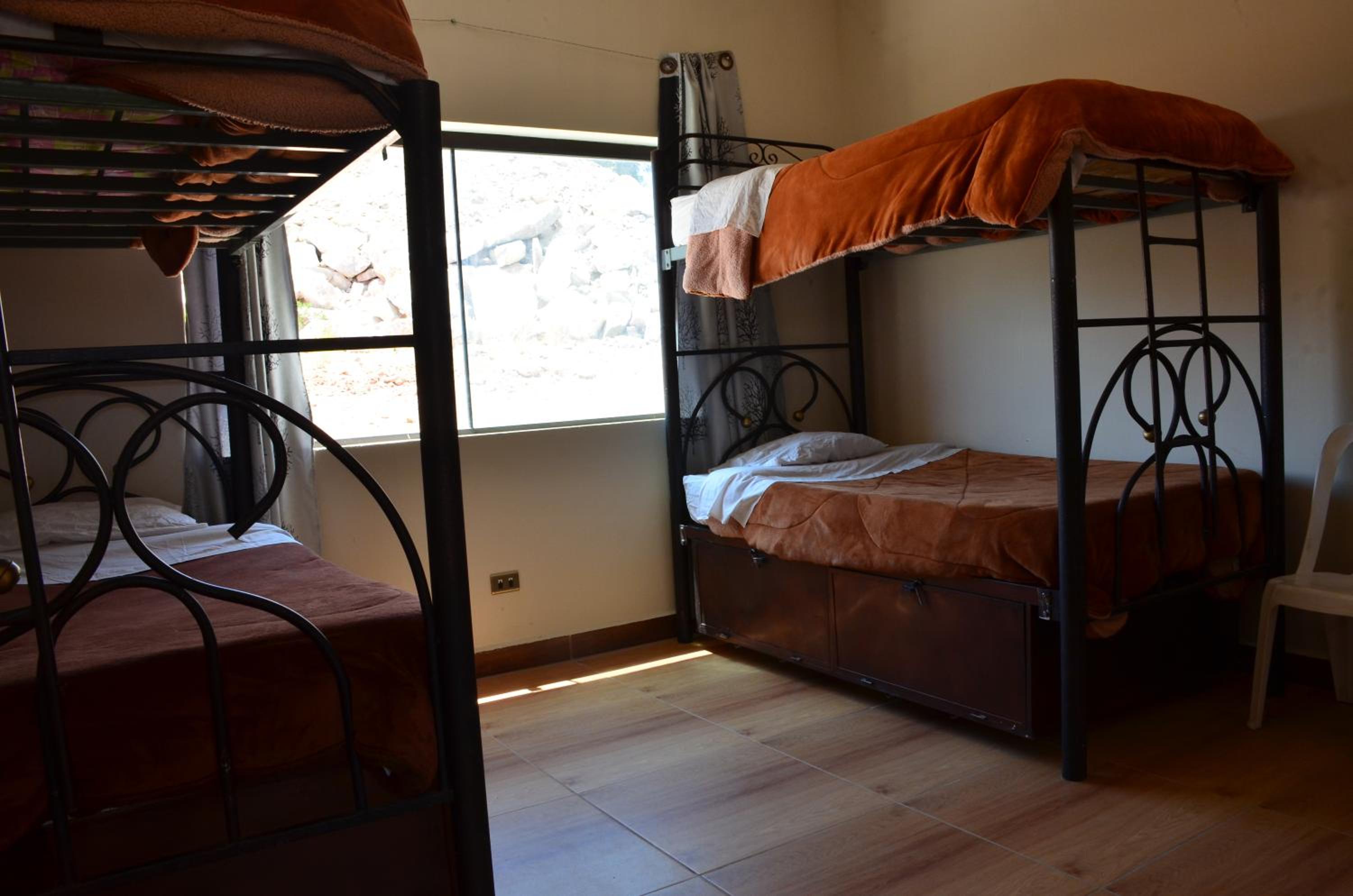 Quadruple Room with Private Bathroom photo 3