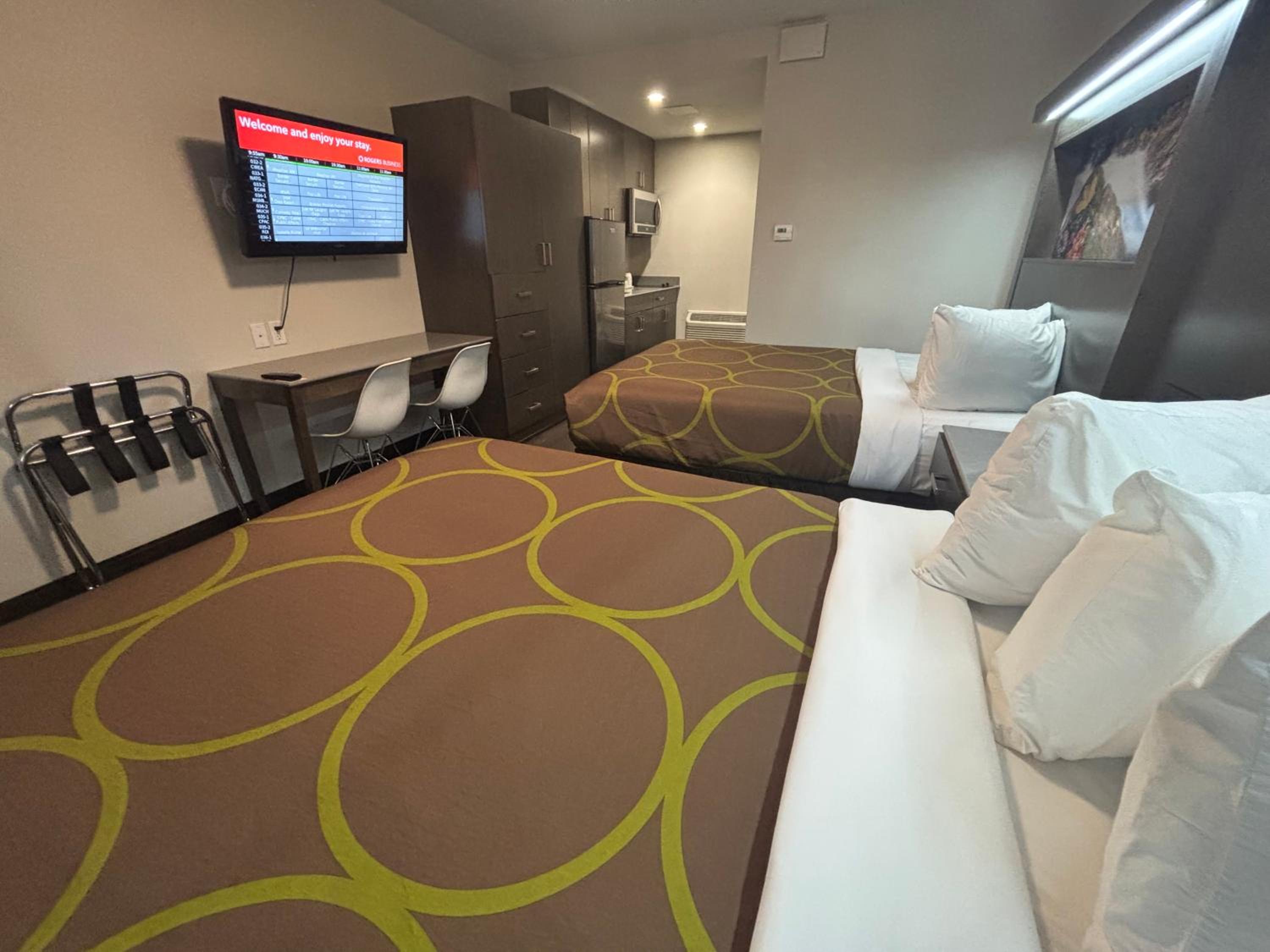 Queen Room with Two Queen Beds and Kitchen - Pet-Friendly/Non-Smoking - Photo 2