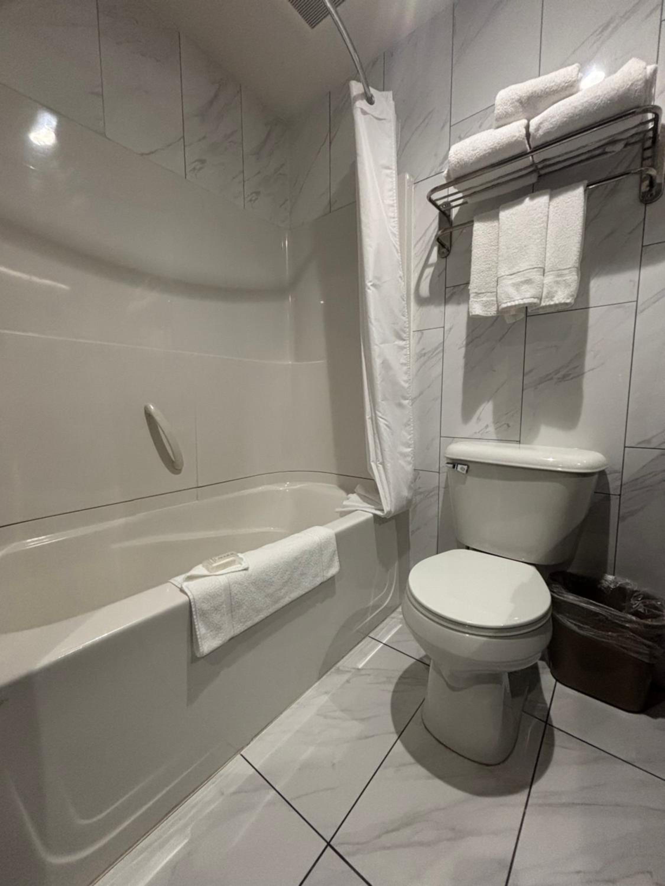 Queen Room with Two Queen Beds and Kitchen - Pet-Friendly/Non-Smoking - Photo 4
