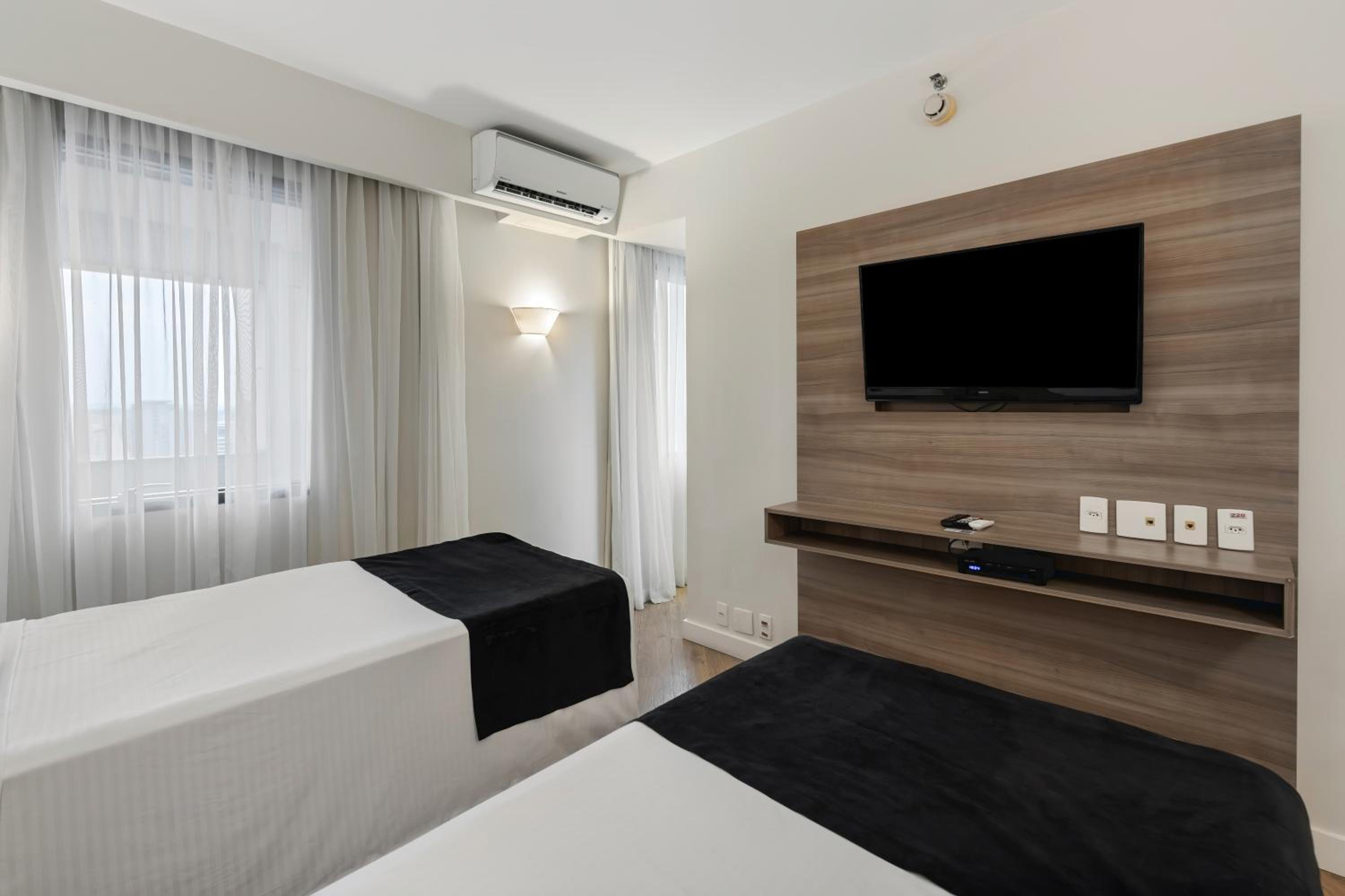 Two-Bedroom King Suite with Two Twin Beds and One Chair Bed photo 1