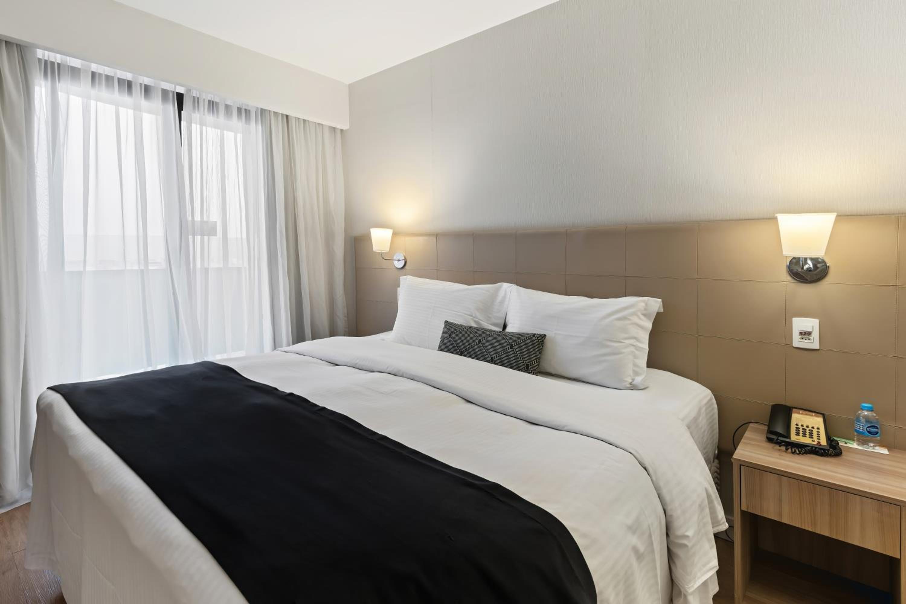 Two-Bedroom King Suite with Two Twin Beds and One Chair Bed photo 3