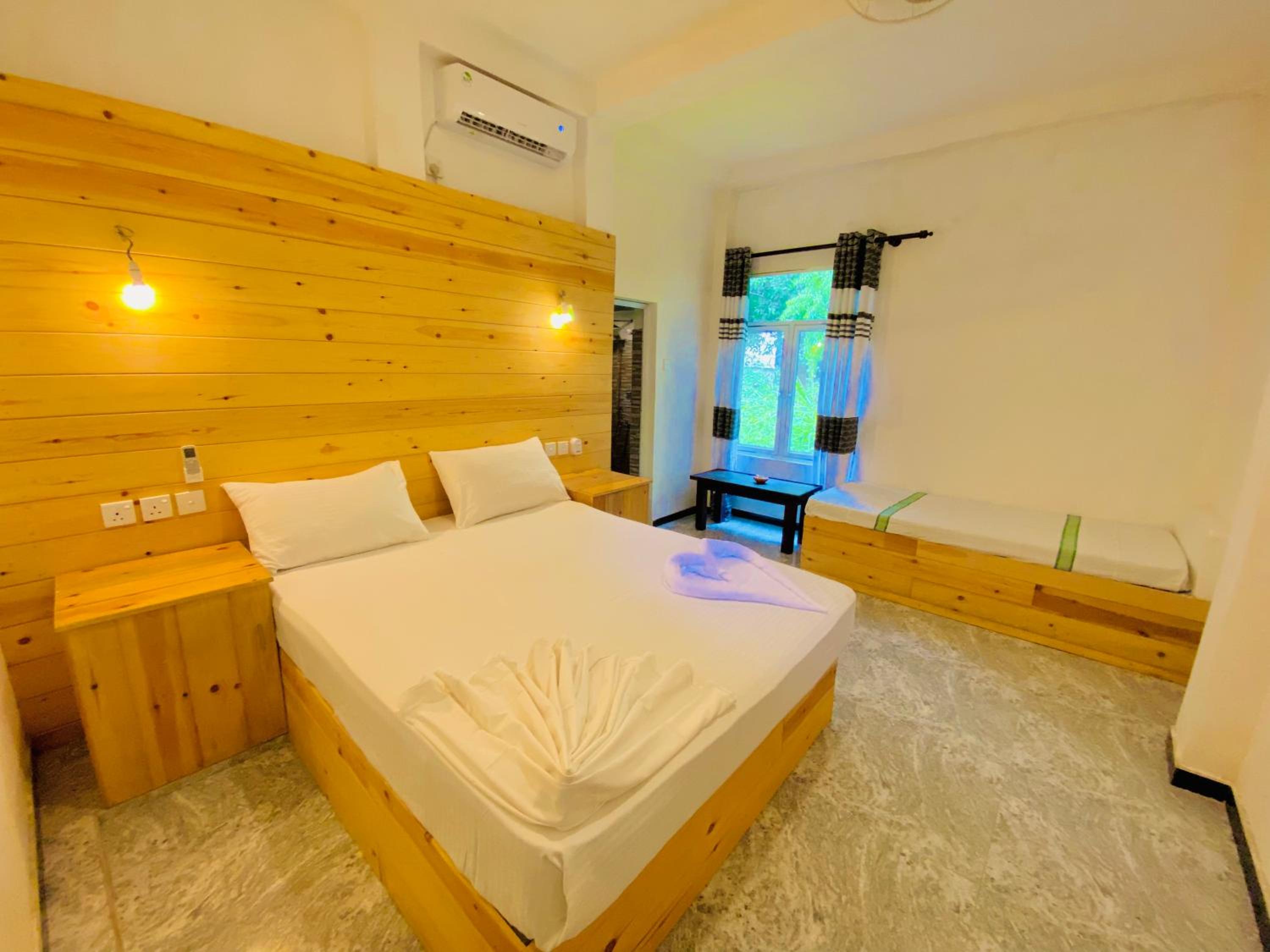 Deluxe Triple Room