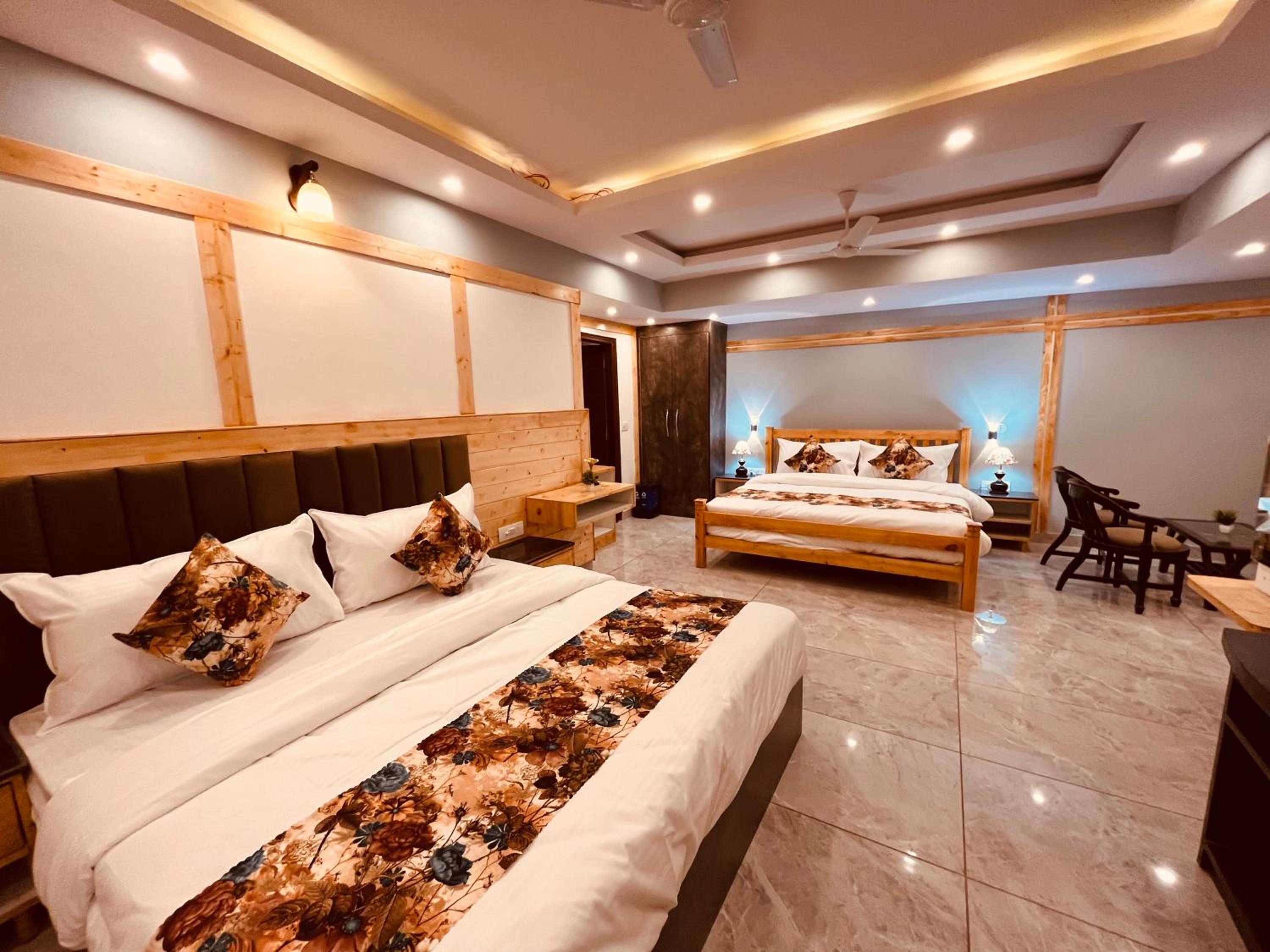 Deluxe Queen Room With Two Queen Beds photo 1