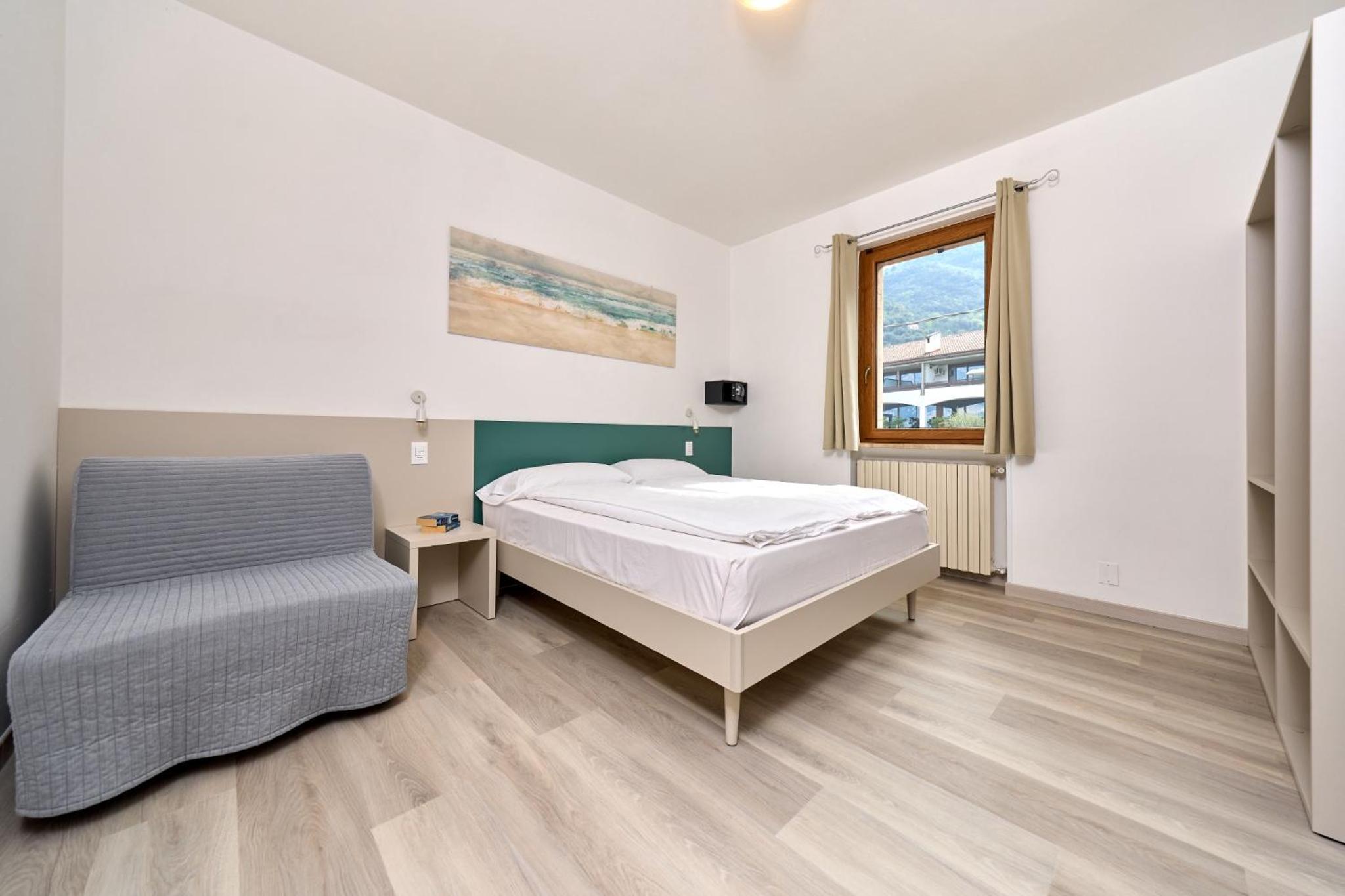 One-Bedroom Apartment with Balcony and Mountain View  