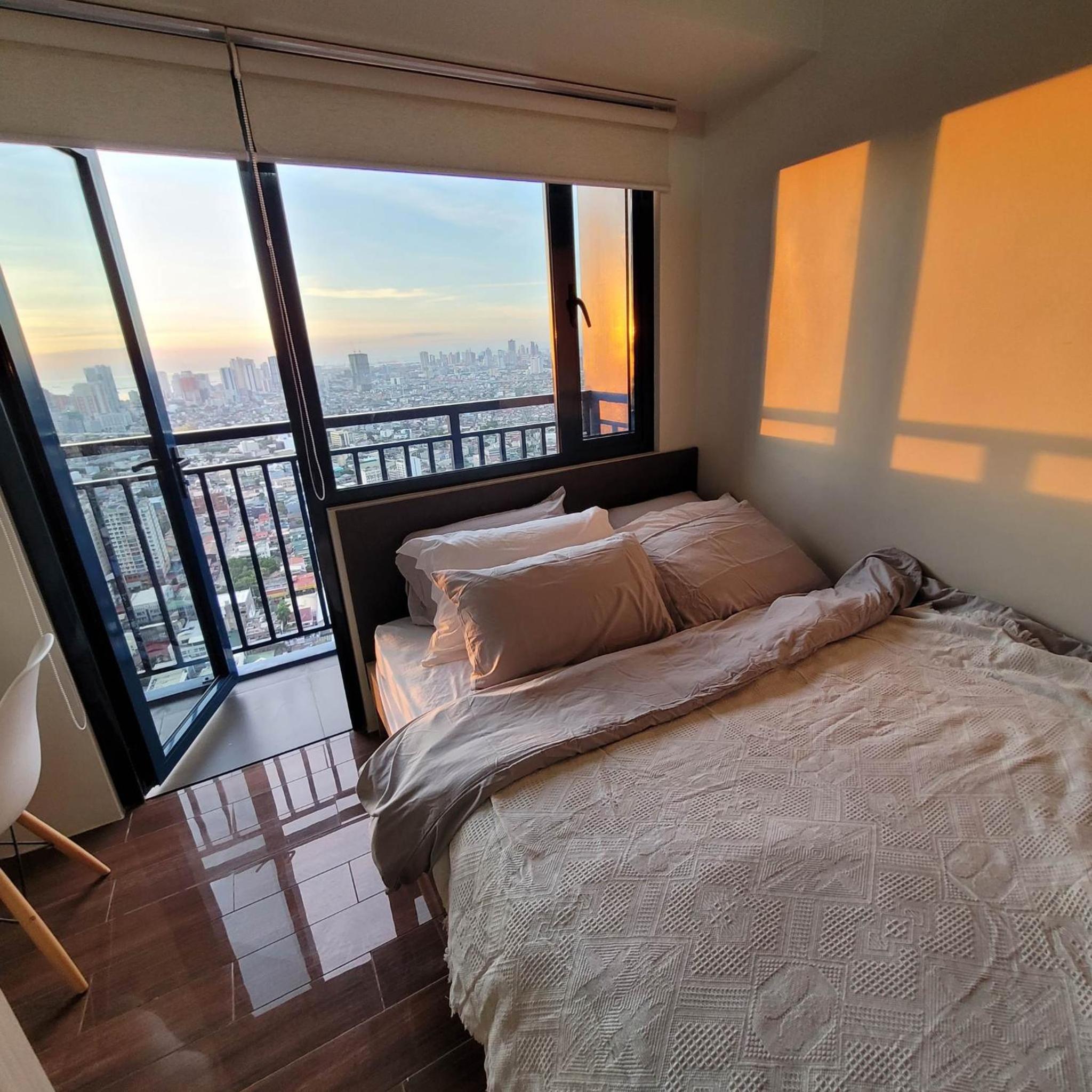 One-Bedroom Apartment with Balcony and City View