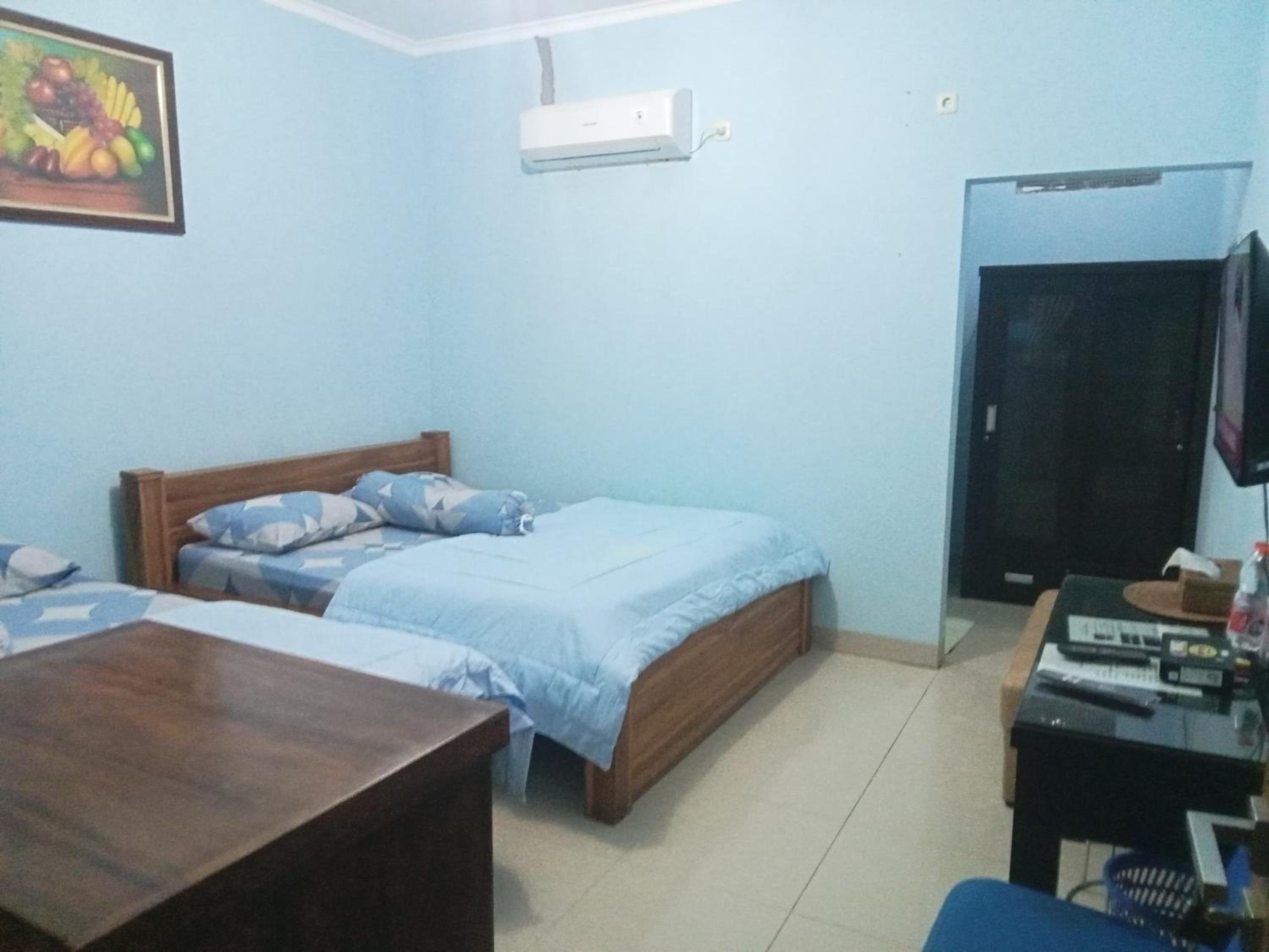 Deluxe Double Room (2 Adults + 1 Child) - Photo 5