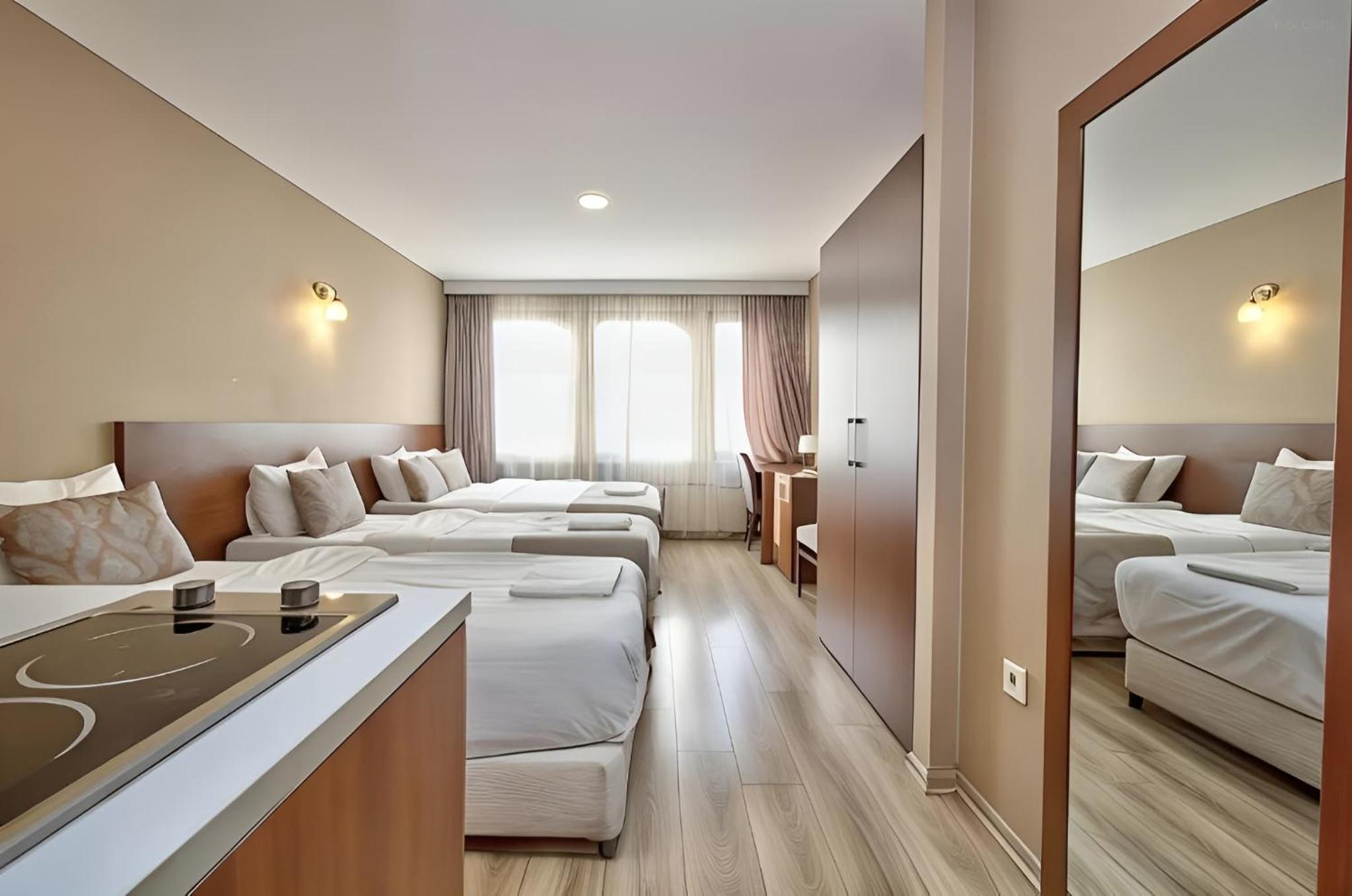 Deluxe Quadruple Room with 4 Adults Occupancy (Non Smoking) photo 1