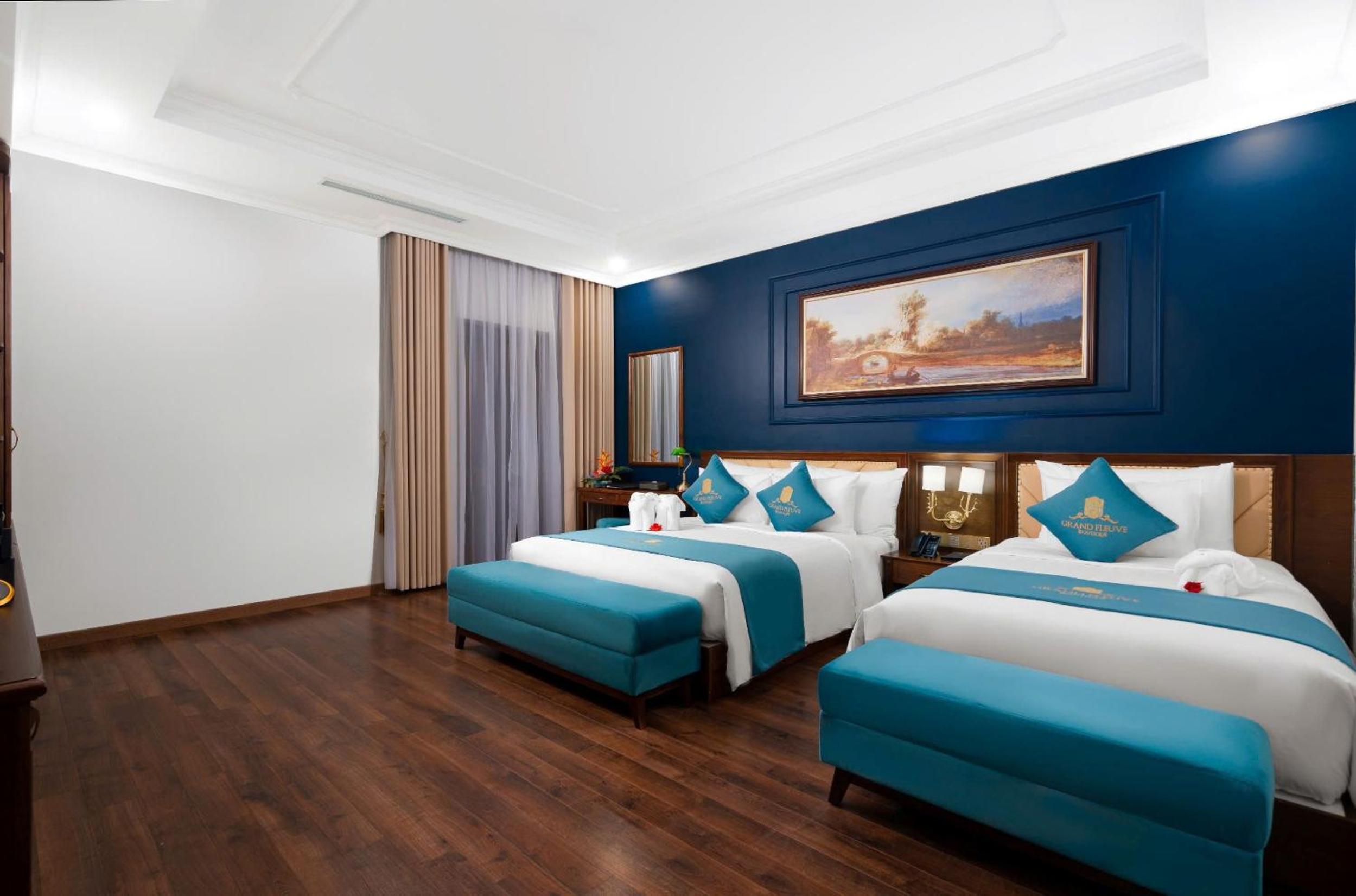 Deluxe Triple Room - Photo 1